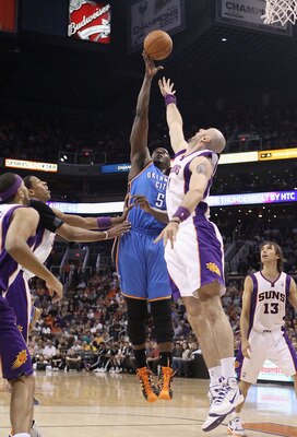 PHOENIX, AZ - MARCH 30:  Kendrick Perkins #5 of the Oklahoma City Thunder puts up a shot during the NBA game against the Phoenix Suns at US Airways Center on March 30, 2011 in Phoenix, Arizona. The Thunder defeated the Suns 116-98.   NOTE TO USER: User ex