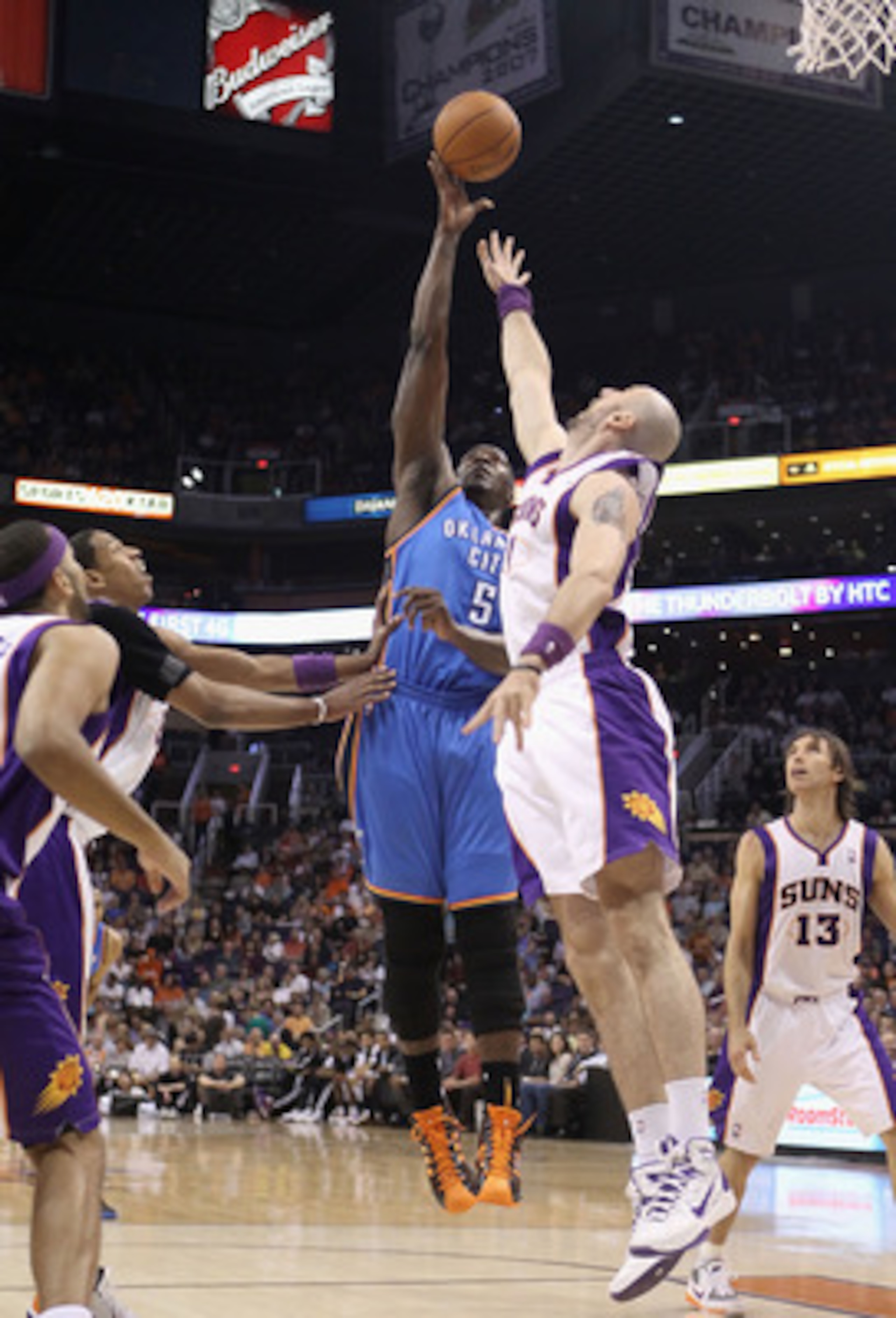 PHOENIX, AZ - MARCH 30:  Kendrick Perkins #5 of the Oklahoma City Thunder puts up a shot during the NBA game against the Phoenix Suns at US Airways Center on March 30, 2011 in Phoenix, Arizona. The Thunder defeated the Suns 116-98.   NOTE TO USER: User ex