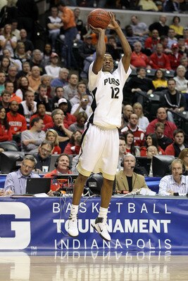 INDIANAPOLIS, IN - MARCH 11:  Kelsey Barlow #12 of the Purdue Boilermakers attempts a shot against the Michigan State Spartans during the quarterfinals of the 2011 Big Ten Men's Basketball Tournament at Conseco Fieldhouse on March 11, 2011 in Indianapolis
