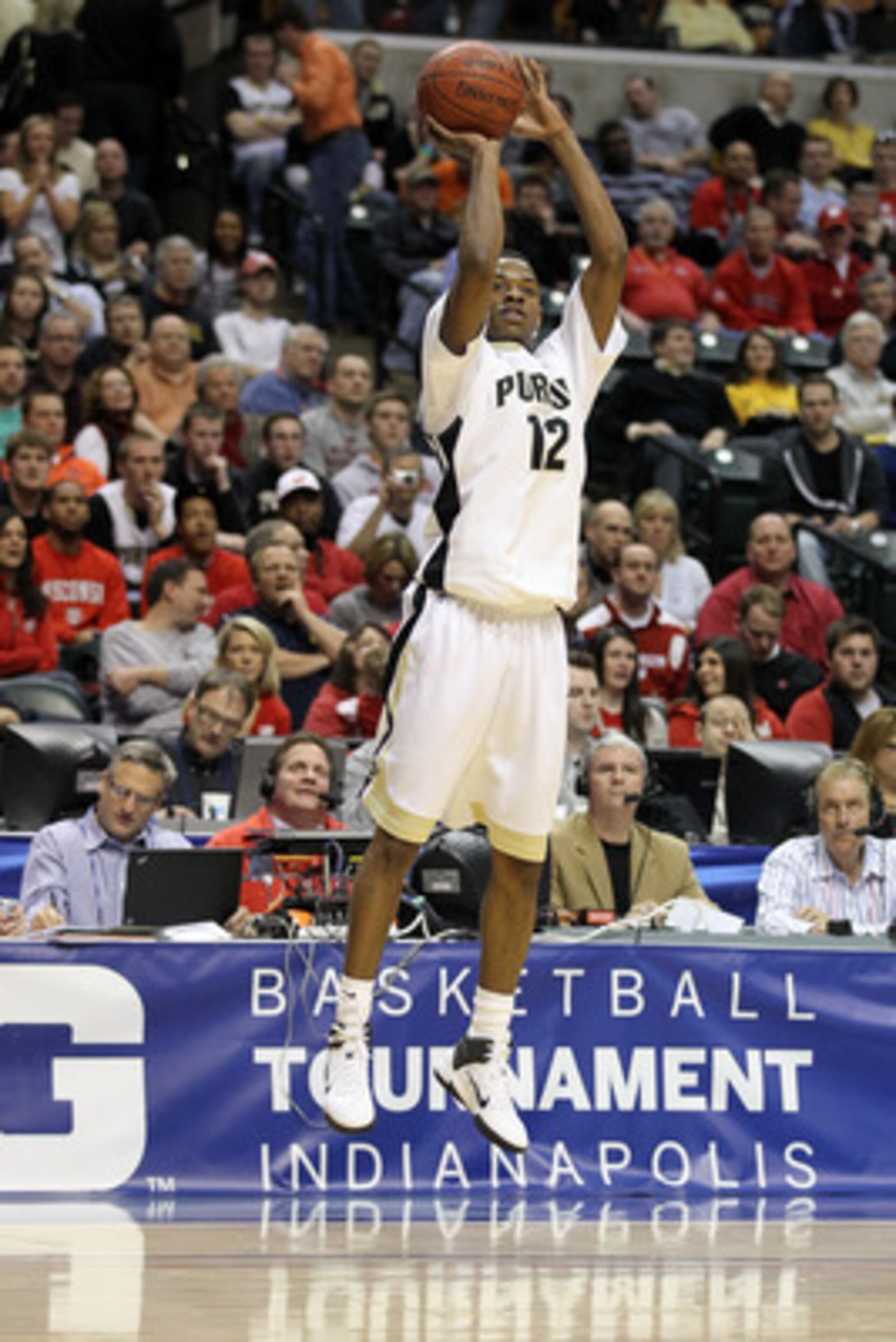 INDIANAPOLIS, IN - MARCH 11:  Kelsey Barlow #12 of the Purdue Boilermakers attempts a shot against the Michigan State Spartans during the quarterfinals of the 2011 Big Ten Men's Basketball Tournament at Conseco Fieldhouse on March 11, 2011 in Indianapolis