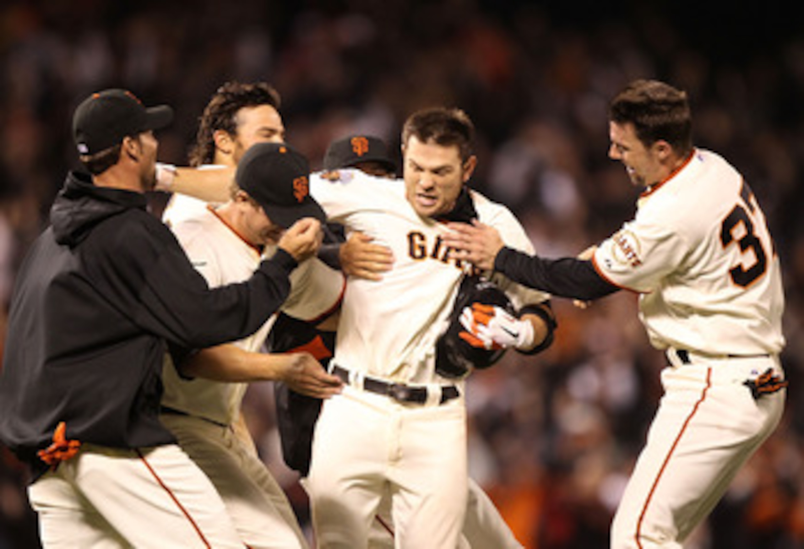 SAN FRANCISCO, CA - JUNE 06:  Freddy Sanchez #21 of the San Francisco Giants celebrates after the game winning hit in the 13th inning against the Washington Nationals during an MLB game at AT&T Park on June 6, 2011 in San Francisco, California.  (Photo by