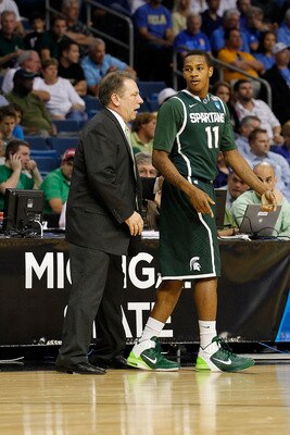 TAMPA, FL - MARCH 17:  Head coach Tom Izzo of the Michigan State Spartans talks with Keith Appling #11 against the UCLA Bruins during the second round of the 2011 NCAA men's basketball tournament at St. Pete Times Forum on March 17, 2011 in Tampa, Florida