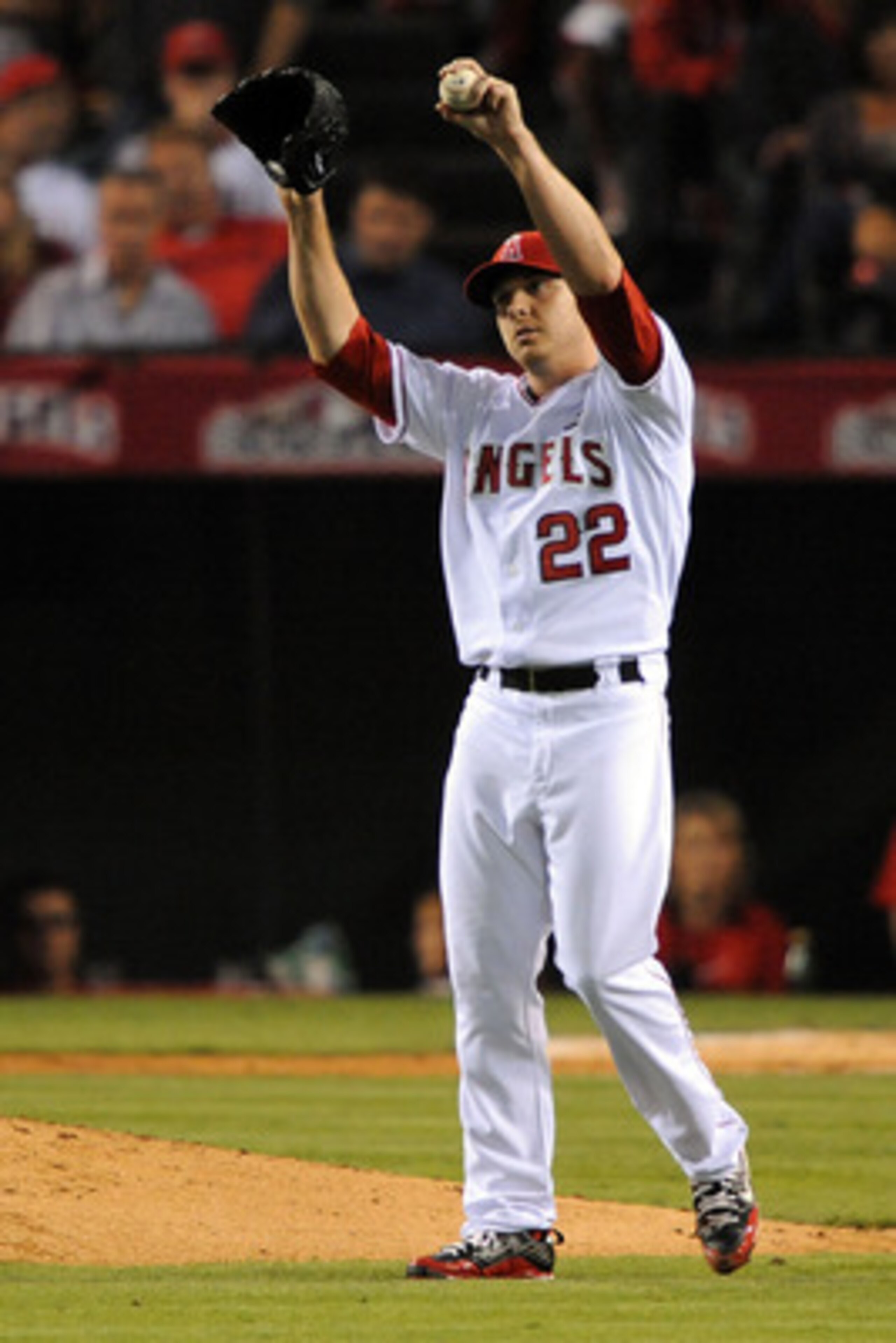 ANAHEIM, CA - OCTOBER 20:  Scott Kazmir #22 of the Los Angeles Angels of Anaheim reacts after giving up a single to Melky Cabrera #53 (Not Shown) of the New York Yankees scoring Jorge Posada #20 (Not Shown) and Robinson Cano #24 (Not Shown) during the for