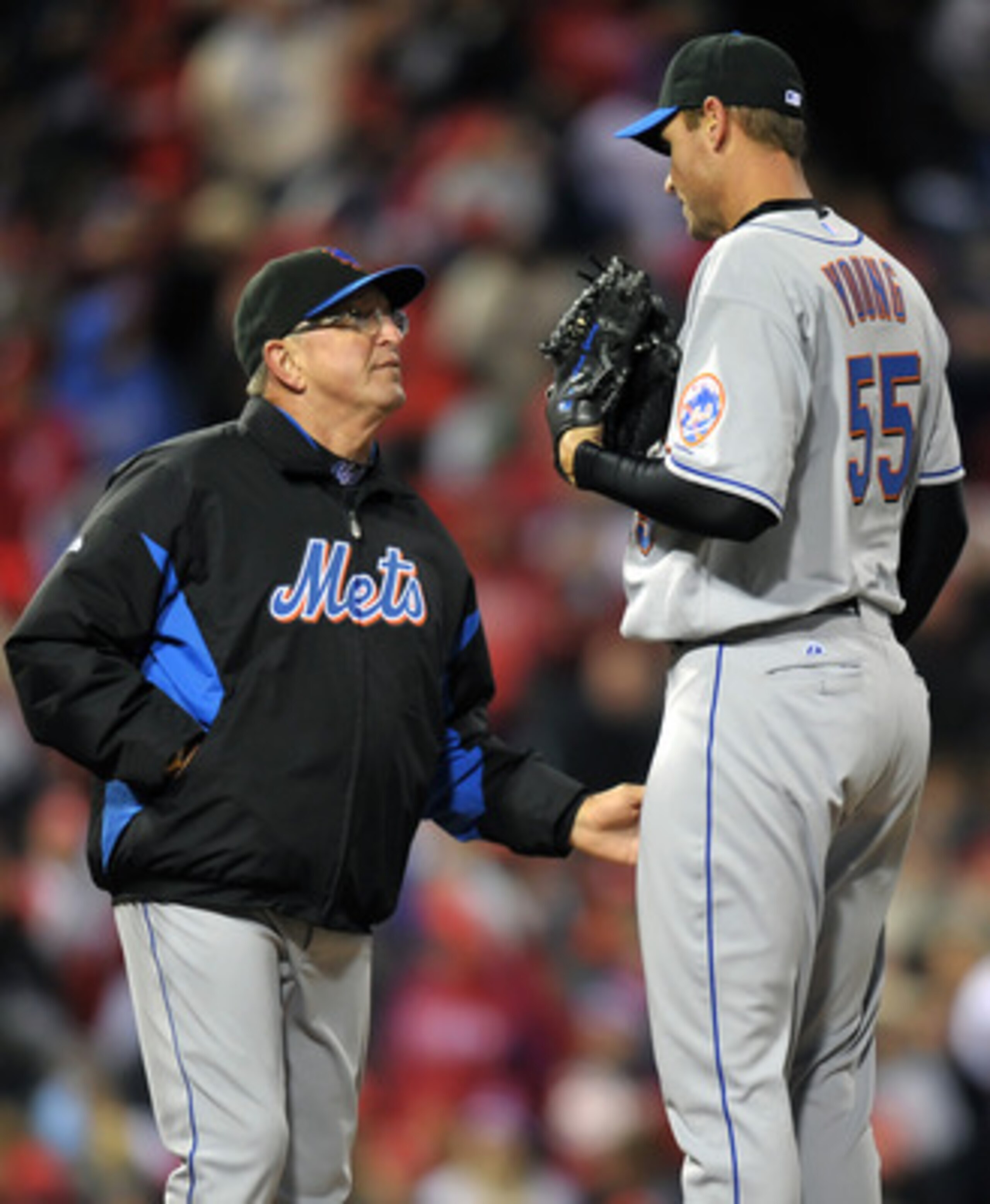 PHILADELPHIA, PA - APRIL 05: Pitching coach Dan Warthen #59 talks with starting pitcher Chris Young #55 of the New York Mets during the game against the Philadelphia Phillies at Citizens Bank on April 5, 2011 Park in Philadelphia, Pennsylvania. The mets w