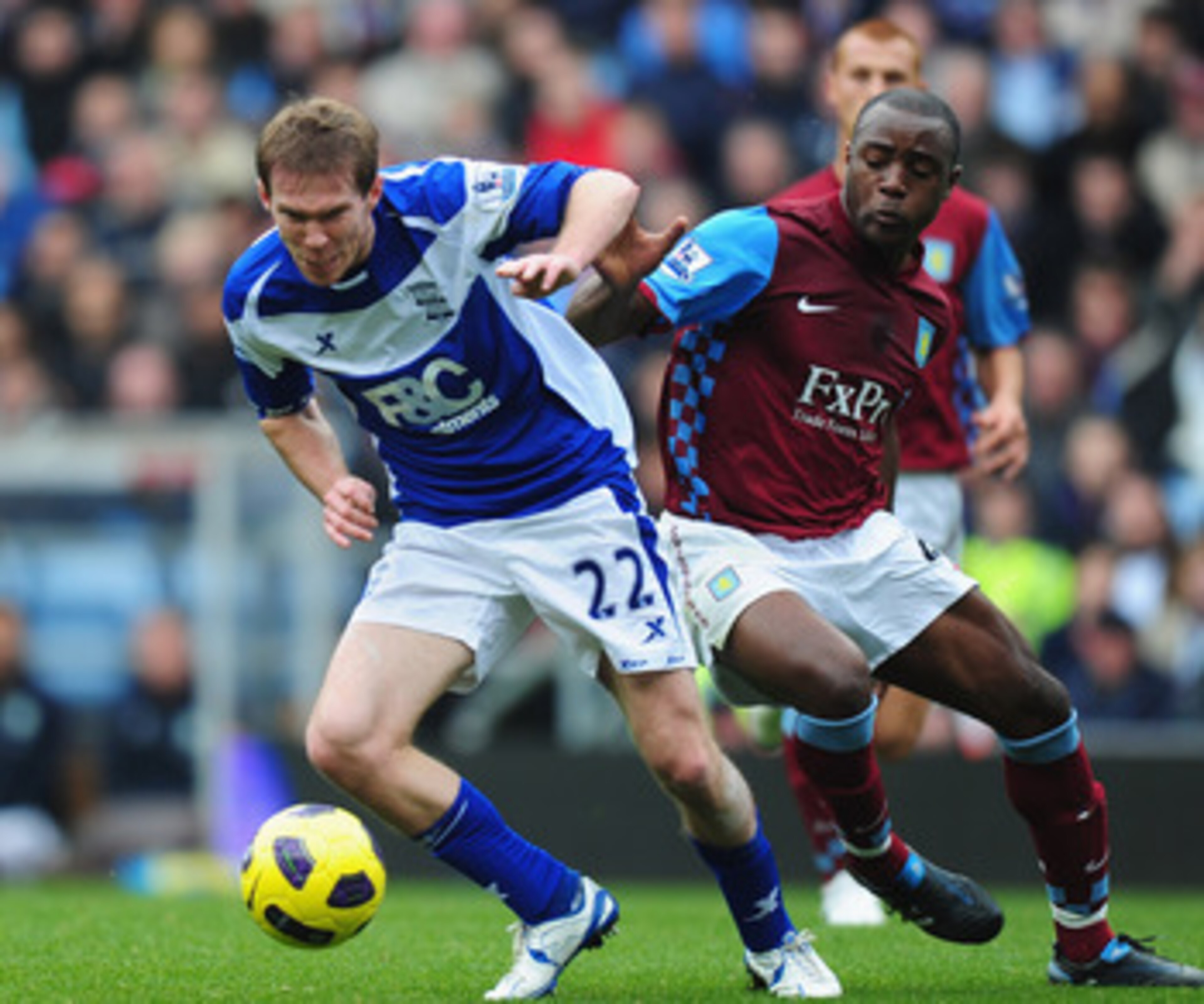 BIRMINGHAM, ENGLAND - OCTOBER 31:  Alexander Hleb of Birmingham is challenged by Nigel Reo-Coker of Birmingham during the Barclays Premier League match between Aston Villa and Birmingham at Villa Park on October 31, 2010 in London, England.  (Photo by Mik