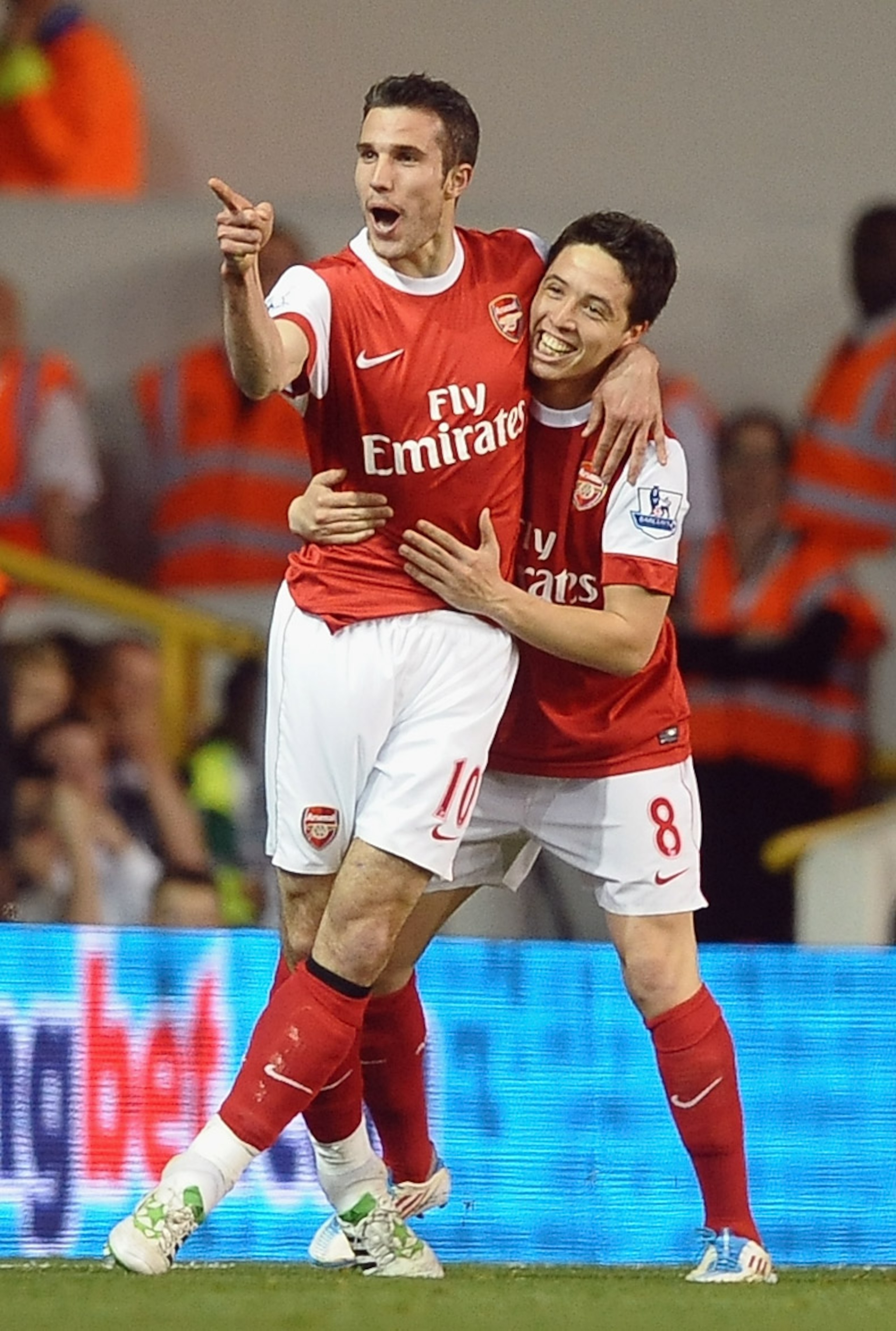 LONDON, ENGLAND - APRIL 20: Robin van Persie of Arsenal celebrates scoring their third goal with team mate Samir Nasri during the Barclays Premier League match between Tottenham Hotspur and Arsenal at White Hart Lane on April 20, 2011 in London, England. LONDON, ENGLAND - APRIL 20: Robin van Persie of Arsenal celebrates scoring their third goal with team mate Samir Nasri during the Barclays Premier League match between Tottenham Hotspur and Arsenal at White Hart Lane on April 20, 2011 in London, England.