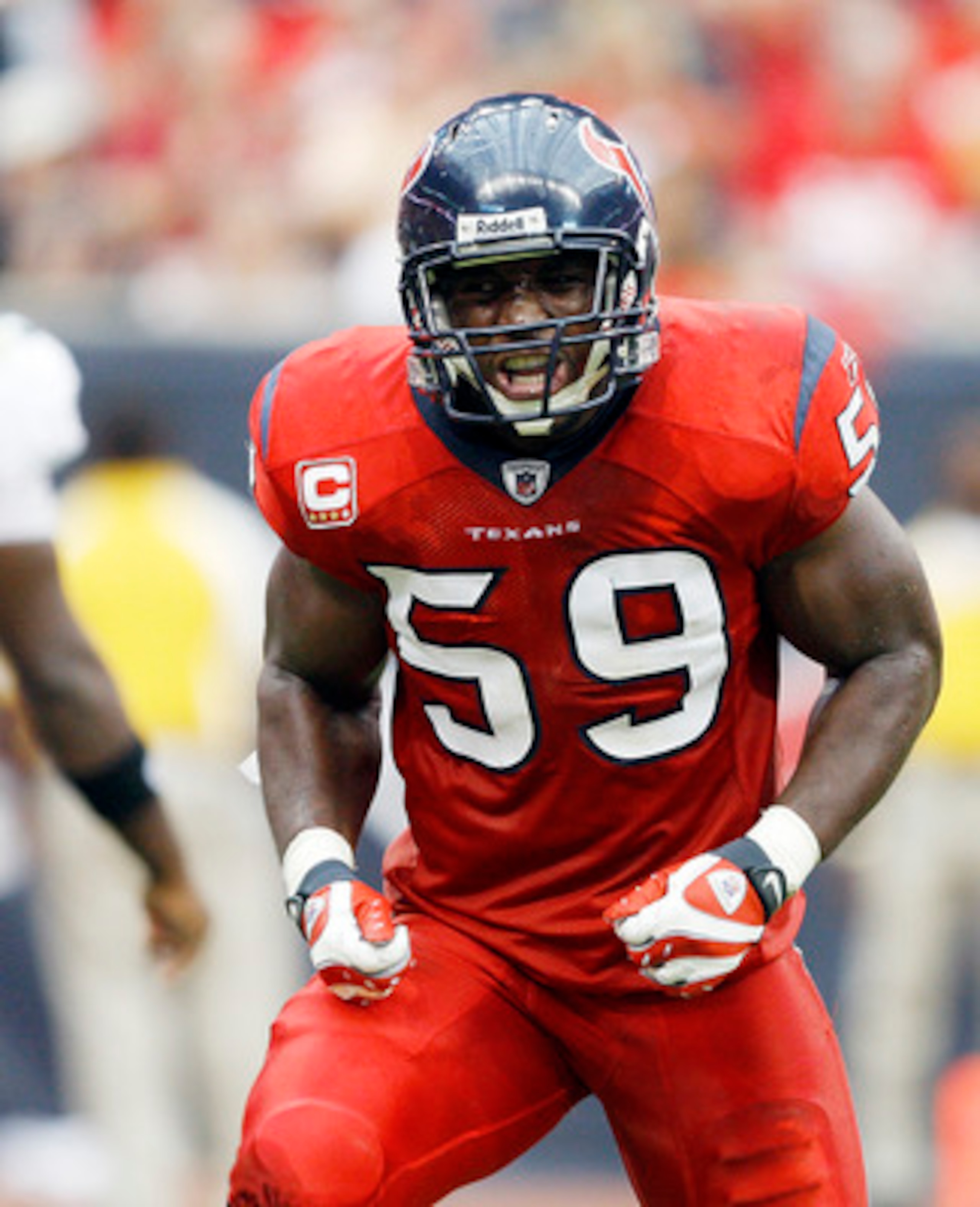 HOUSTON - SEPTEMBER 27:  Linebacker DeMeco Ryans #59 of the Houston Texans after making a big tackle on a run by Jacksonville Jaguars running back Maurice Drew-Jones in the fourth quarter at Reliant Stadium on September 27, 2009 in Houston, Texas.  (Photo