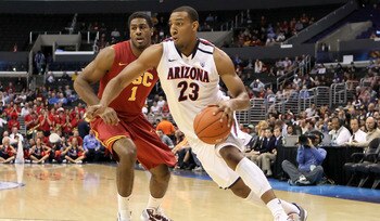 LOS ANGELES, CA - MARCH 11:  Derrick Williams #23 of the Arizona Wildcats drives on Alex Stepheson #1 of the USC Trojans in the first half in the semifinals of the 2011 Pacific Life Pac-10 Men's Basketball Tournament at Staples Center on March 11, 2011 in