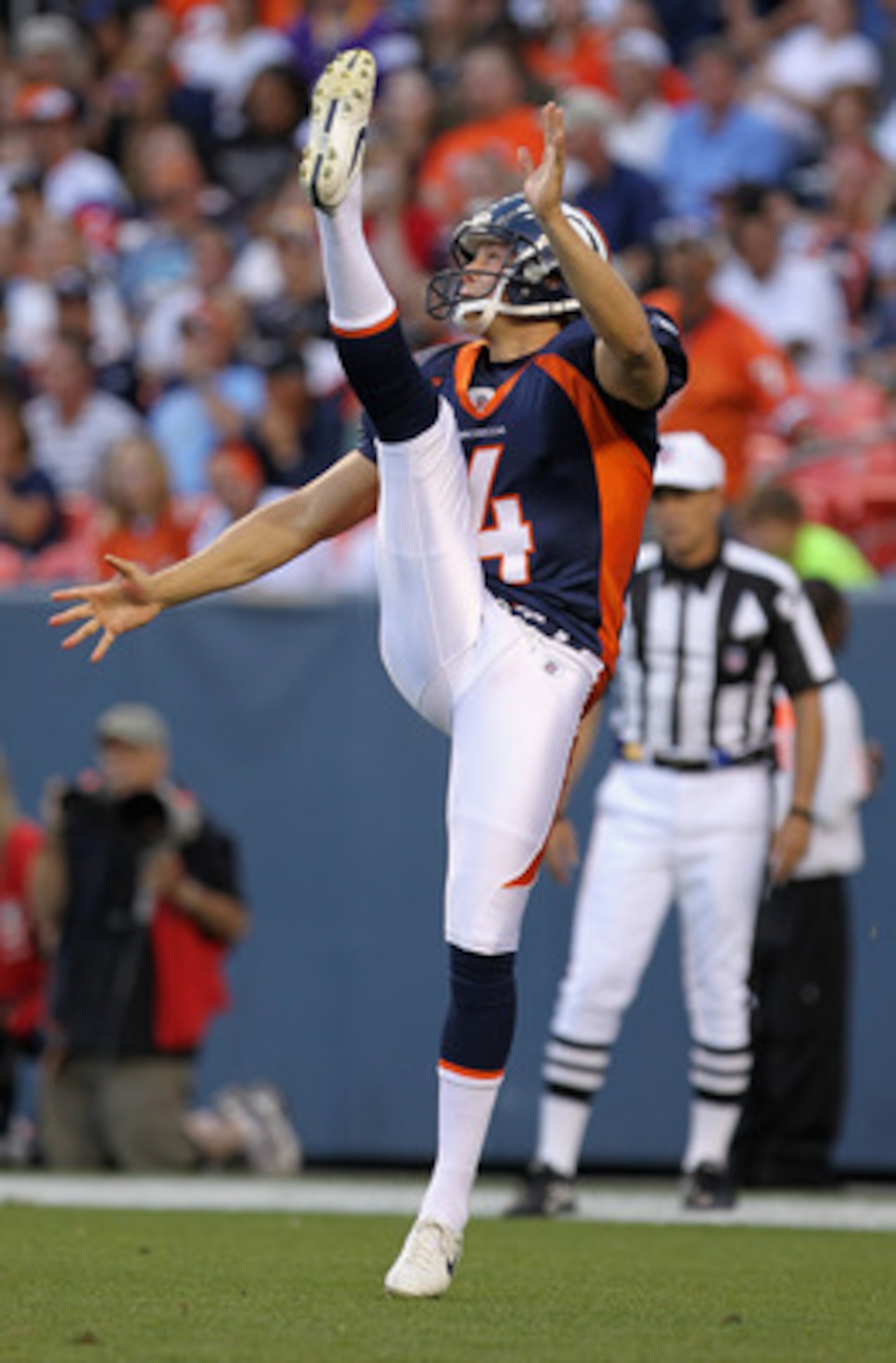 DENVER - AUGUST 29: Punter Britton Colquitt #4 of the Denver Broncos delivers the ball to the Pittsburgh Steelers during preseason NFL action at INVESCO Field at Mile High on August 29, 2010 in Denver, Colorado. (Photo by Doug Pensinger/Getty Images) DENVER - AUGUST 29: Punter Britton Colquitt #4 of the Denver Broncos delivers the ball to the Pittsburgh Steelers during preseason NFL action at INVESCO Field at Mile High on August 29, 2010 in Denver, Colorado. (Photo by Doug Pensinger/Getty Images)