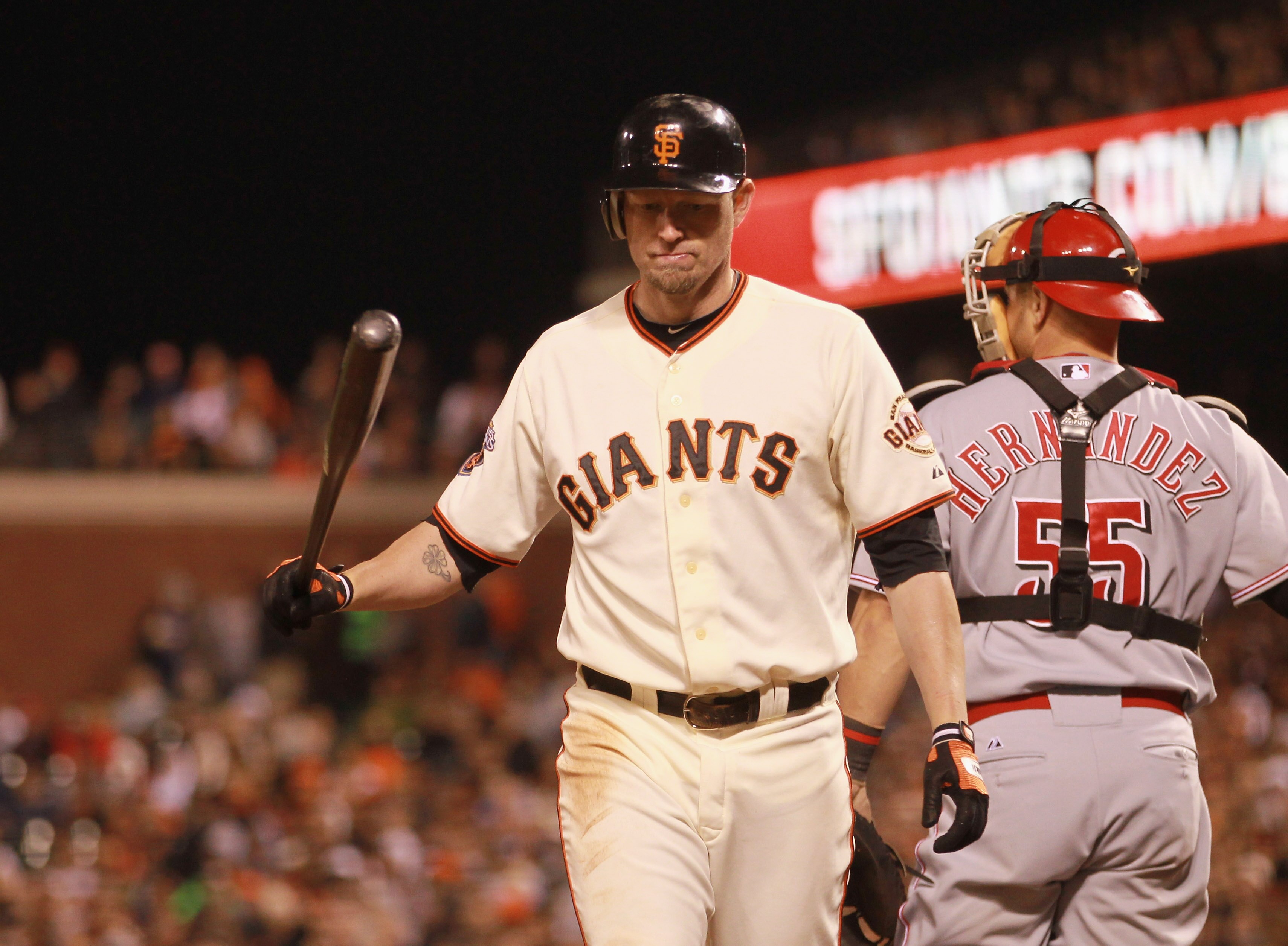 SAN FRANCISCO, CA - JUNE 09:  Aubrey Huff #17 of the San Francisco Giants walks back to the dugout after he struck out in the sixth inning against the Cincinnati Reds at AT&T Park on June 9, 2011 in San Francisco, California.  (Photo by Ezra Shaw/Getty Im