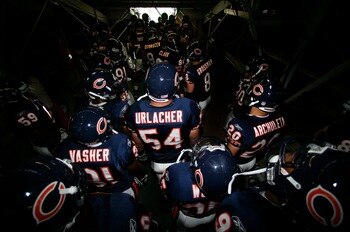 SAN DIEGO - SEPTEMBER 9:   Linebacker Brian Urlacher #54 of the Chicago Bears and his teammates prepare to enter the game against San Diego Chargers at Qualcomm Stadium September 9, 2007 in San Diego, California.  (Photo by Donald Miralle/Getty Images)