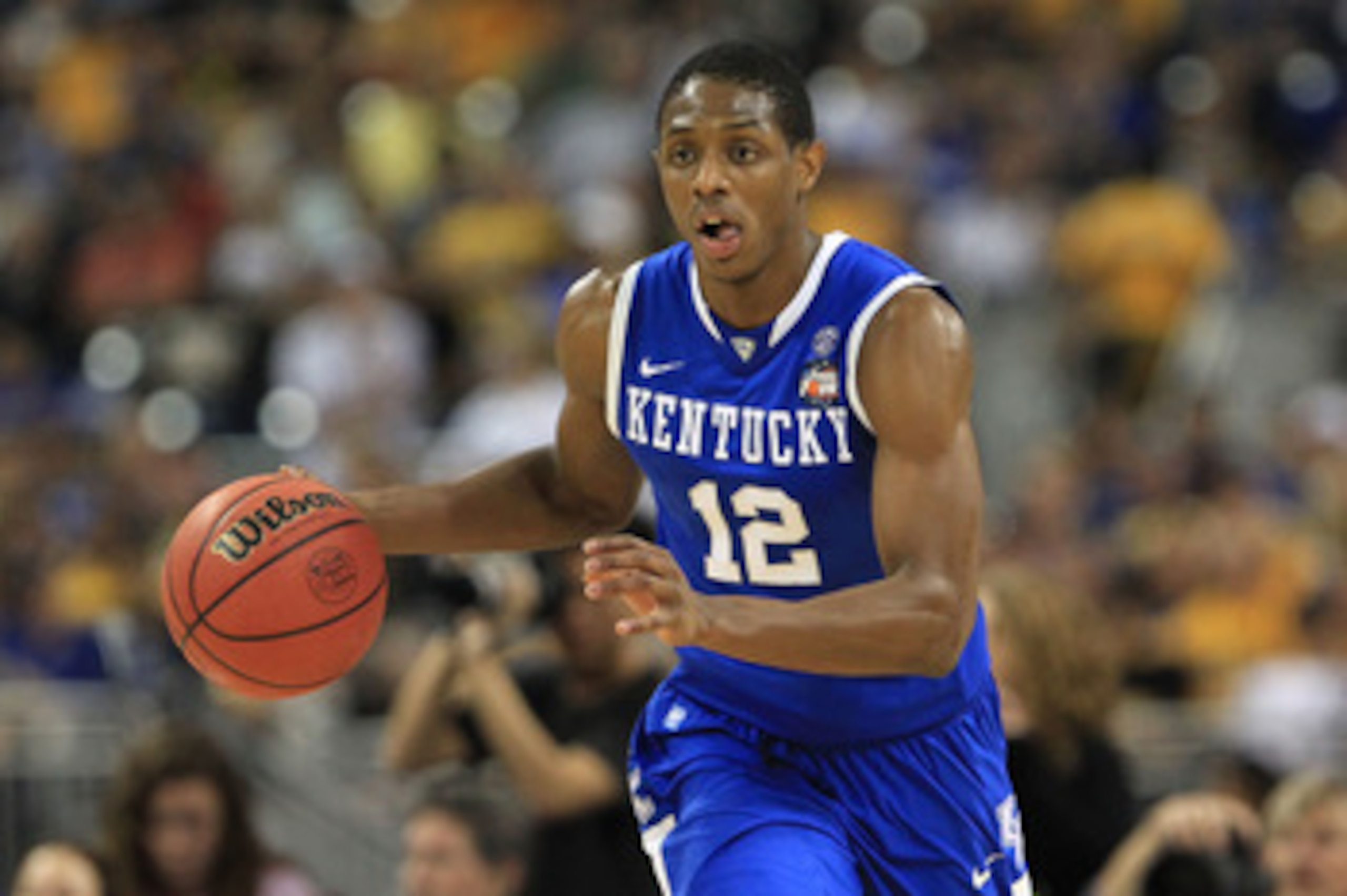 HOUSTON, TX - APRIL 02:  Brandon Knight #12 of the Kentucky Wildcats moves the ball while taking on the Connecticut Huskies during the National Semifinal game of the 2011 NCAA Division I Men's Basketball Championship at Reliant Stadium on April 2, 2011 in