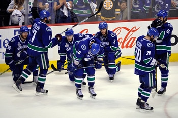 VANCOUVER, BC - JUNE 15:  The Vancouver Canucks react after being defeated by the Boston Bruins in Game Seven of the 2011 NHL Stanley Cup Final at Rogers Arena on June 15, 2011 in Vancouver, British Columbia, Canada. The Boston Bruins defeated the Vancouv