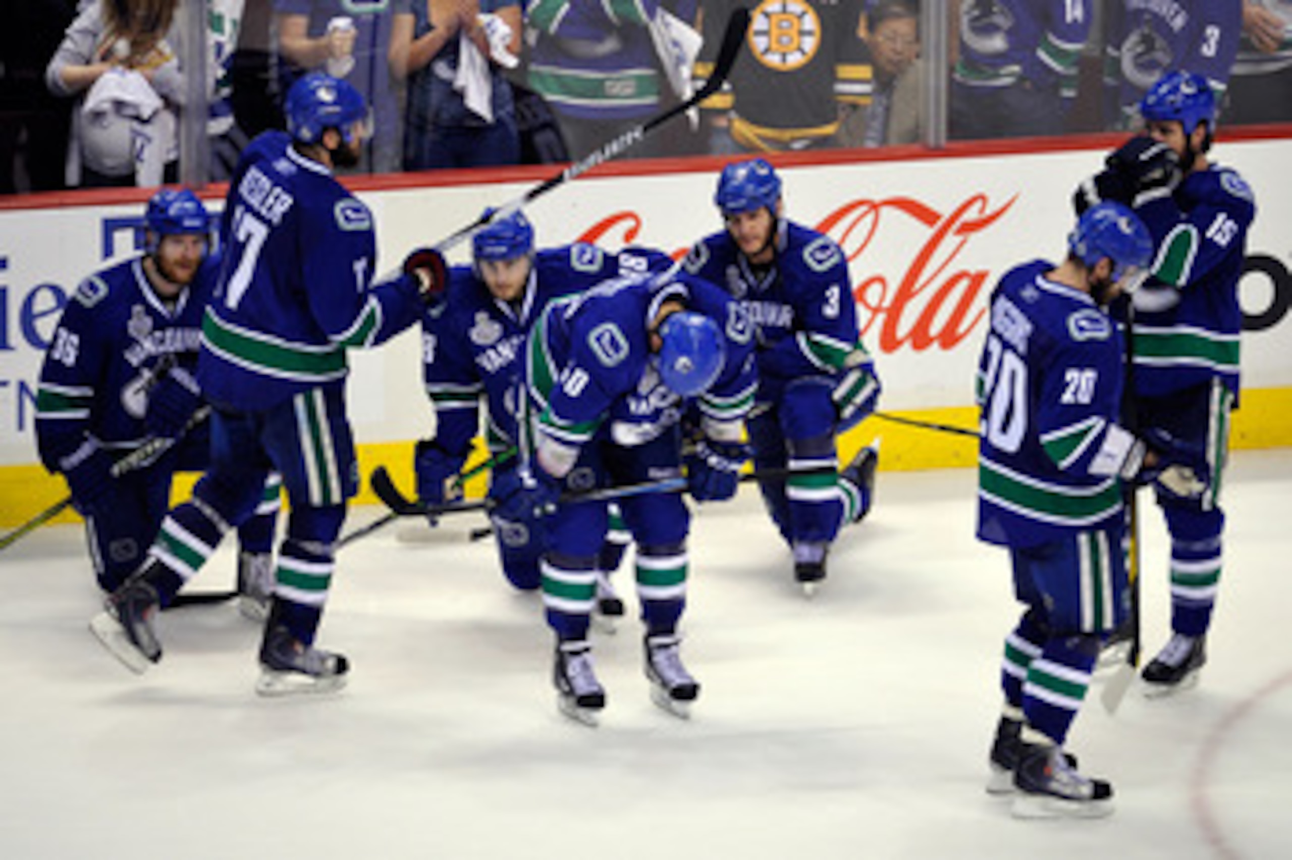 VANCOUVER, BC - JUNE 15:  The Vancouver Canucks react after being defeated by the Boston Bruins in Game Seven of the 2011 NHL Stanley Cup Final at Rogers Arena on June 15, 2011 in Vancouver, British Columbia, Canada. The Boston Bruins defeated the Vancouv