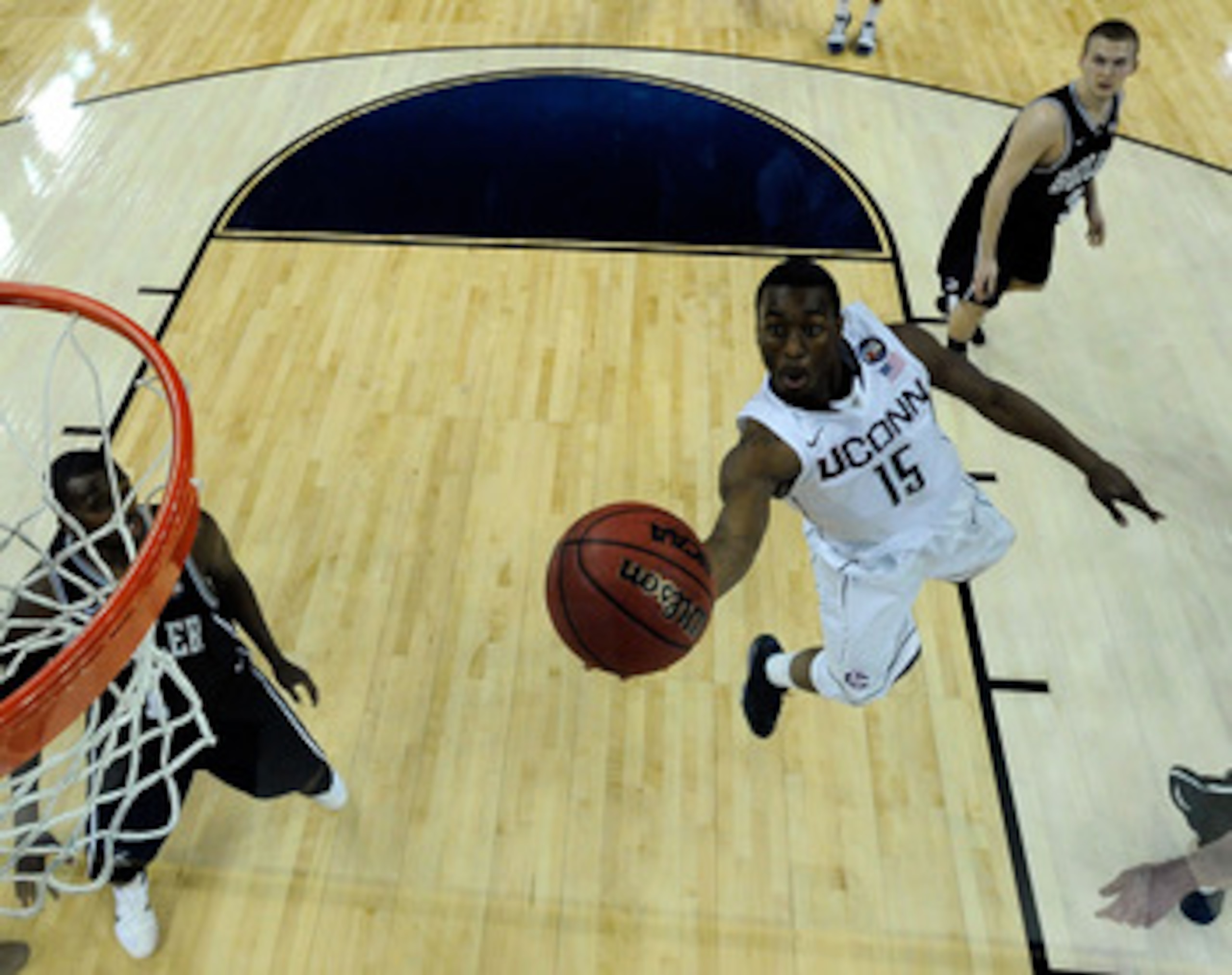 HOUSTON, TX - APRIL 04:  Kemba Walker #15 of the Connecticut Huskies goes to the basket against the Butler Bulldogs during the National Championship Game of the 2011 NCAA Division I Men's Basketball Tournament at Reliant Stadium on April 4, 2011 in Housto
