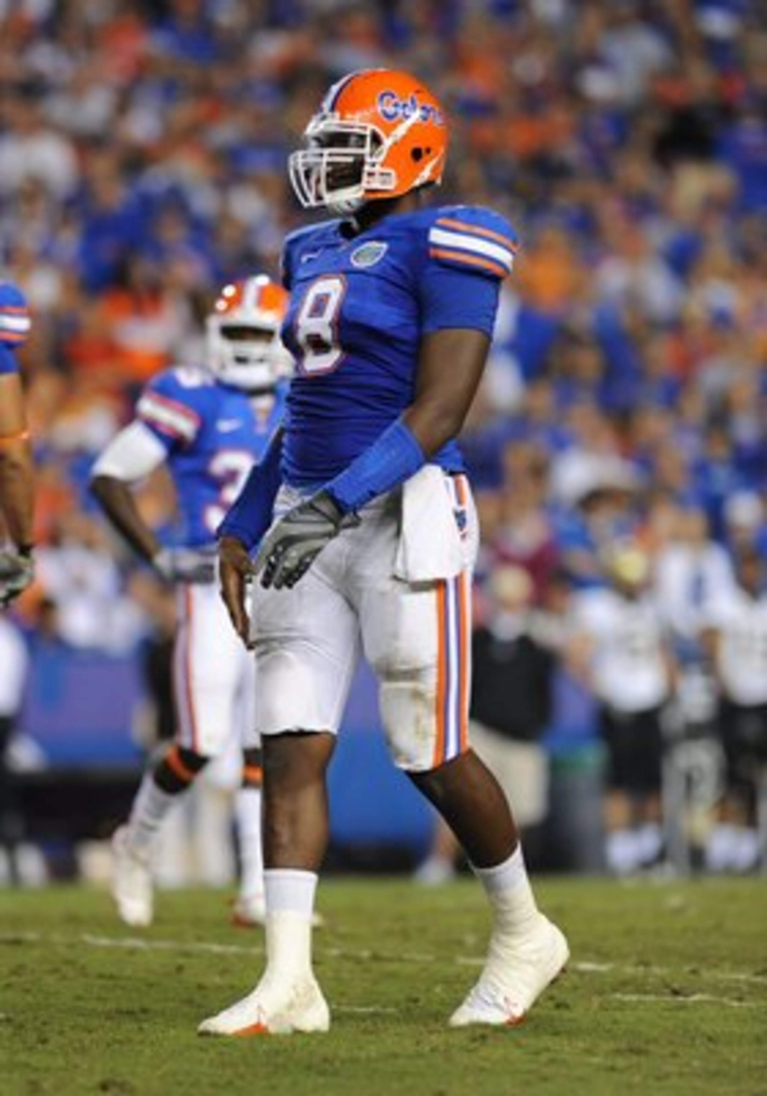 GAINESVILLE, FL - NOVEMBER 7: Defensive end Carlos Dunlap #8  of the Florida Gators sets on defense against the Vanderbilt Commodores  on November 7, 2009 at Ben Hill Griffin Stadium in Gainesville, Florida.  (Photo by Al Messerschmidt/Getty Images)