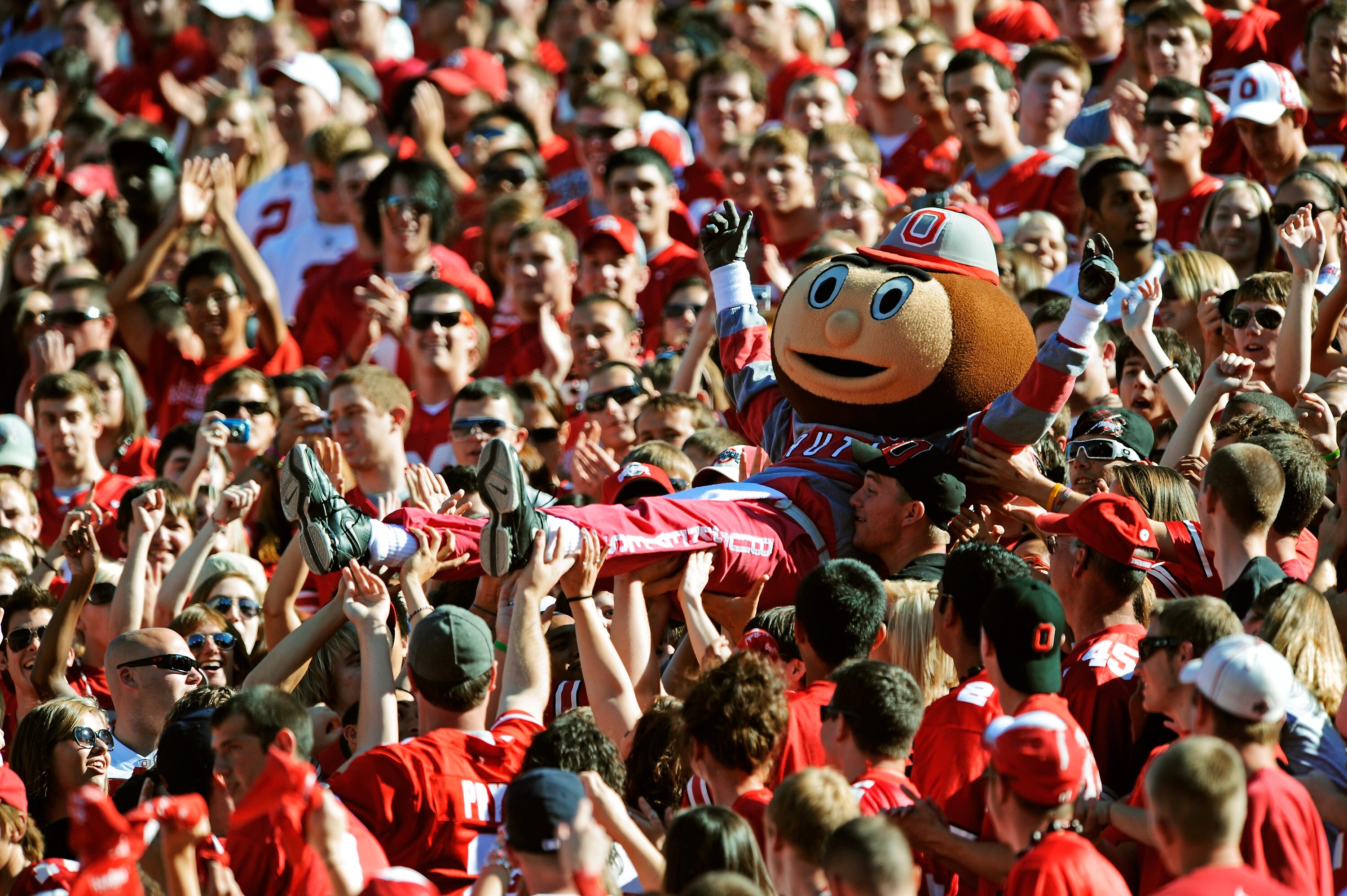 COLUMBUS, OH - SEPTEMBER 25:  Mascot Brutus Buckeye is carried up the stands by fans during a game against the Eastern Michigan Eagles at Ohio Stadium on September 25, 2010 in Columbus, Ohio.  (Photo by Jamie Sabau/Getty Images)