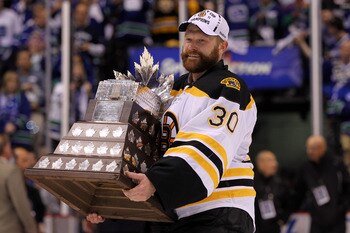 VANCOUVER, BC - JUNE 15:  Tim Thomas #30 of the Boston Bruins is awarded the Conn Smythe Trophy after defeating the Vancouver Canucks in Game Seven of the 2011 NHL Stanley Cup Final at Rogers Arena on June 15, 2011 in Vancouver, British Columbia, Canada.