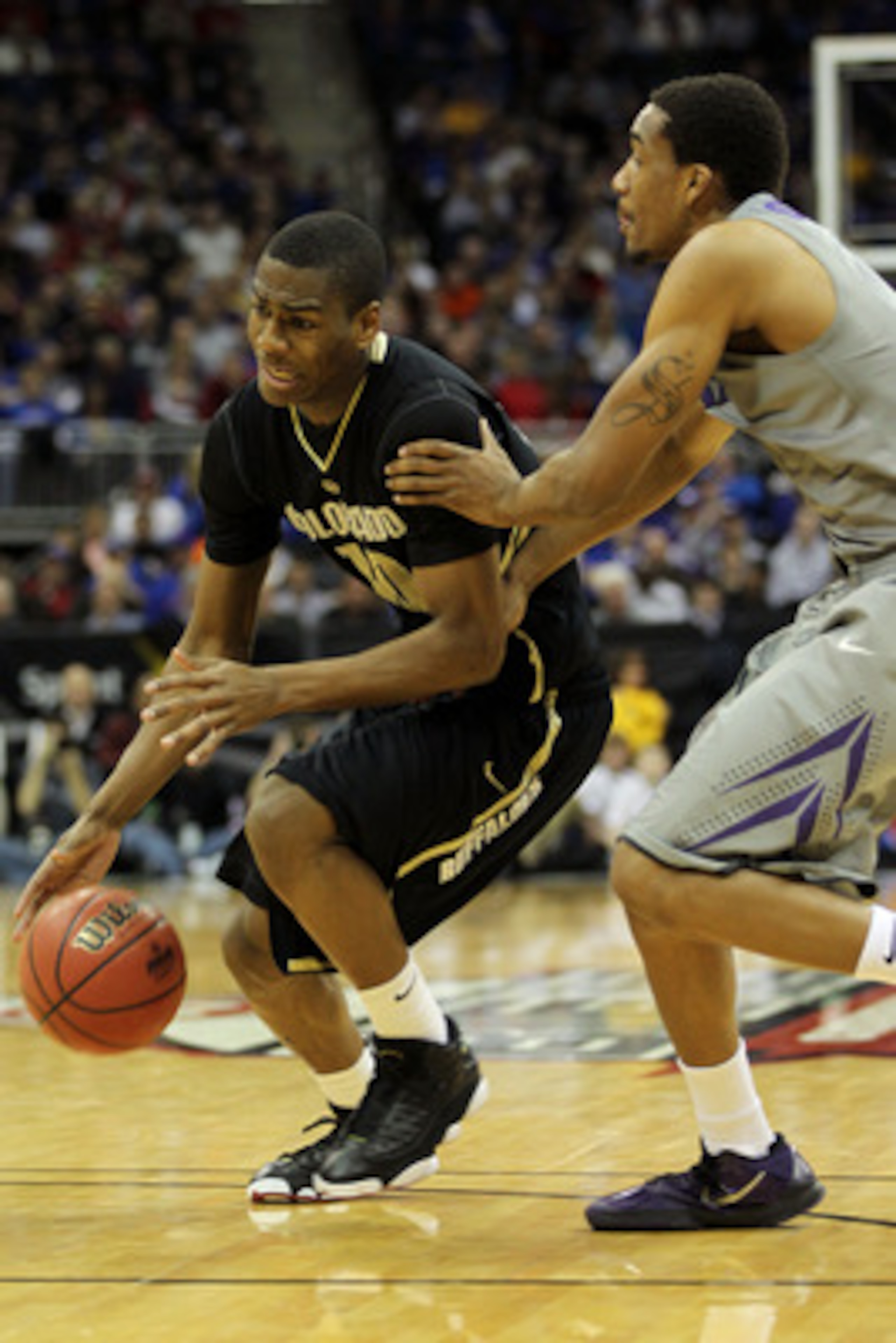 KANSAS CITY, MO - MARCH 10:  Alec Burks #10 of the Colorado Buffaloes drives with the ball against the Kansas State Wildcats during their quarterfinal game in the 2011 Phillips 66 Big 12 Men's Basketball Tournament at Sprint Center on March 10, 2011 in Ka