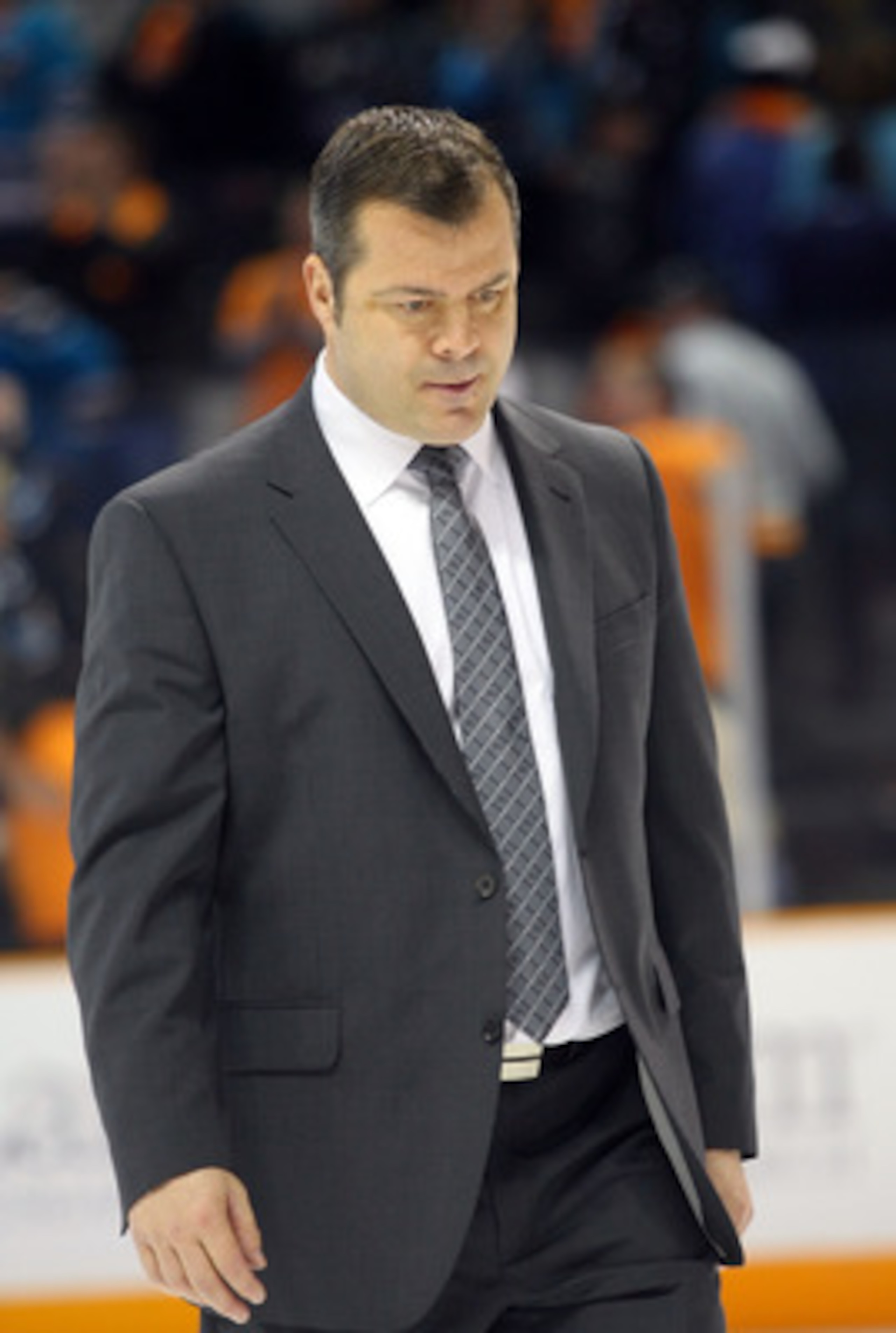SAN JOSE, CA - MAY 20:  Head Coach Alain Vigneault of the Vancouver Canucks walks off the ice after Game Three of the Western Conference Finals against the San Jose Sharks during the 2011 Stanley Cup Playoffs at HP Pavilion on May 20, 2011 in San Jose, Ca