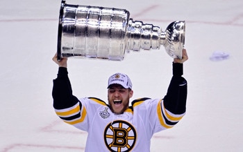 VANCOUVER, BC - JUNE 15:  Daniel Paille #20 of the Boston Bruins celebrates with the Stanley Cup after defeating the Vancouver Canucks in Game Seven of the 2011 NHL Stanley Cup Final at Rogers Arena on June 15, 2011 in Vancouver, British Columbia, Canada.