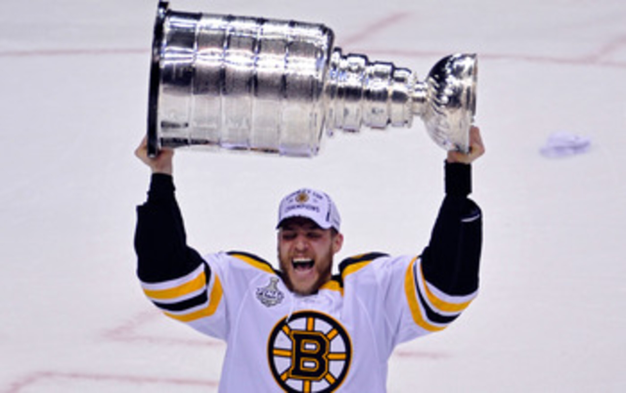 VANCOUVER, BC - JUNE 15:  Daniel Paille #20 of the Boston Bruins celebrates with the Stanley Cup after defeating the Vancouver Canucks in Game Seven of the 2011 NHL Stanley Cup Final at Rogers Arena on June 15, 2011 in Vancouver, British Columbia, Canada.