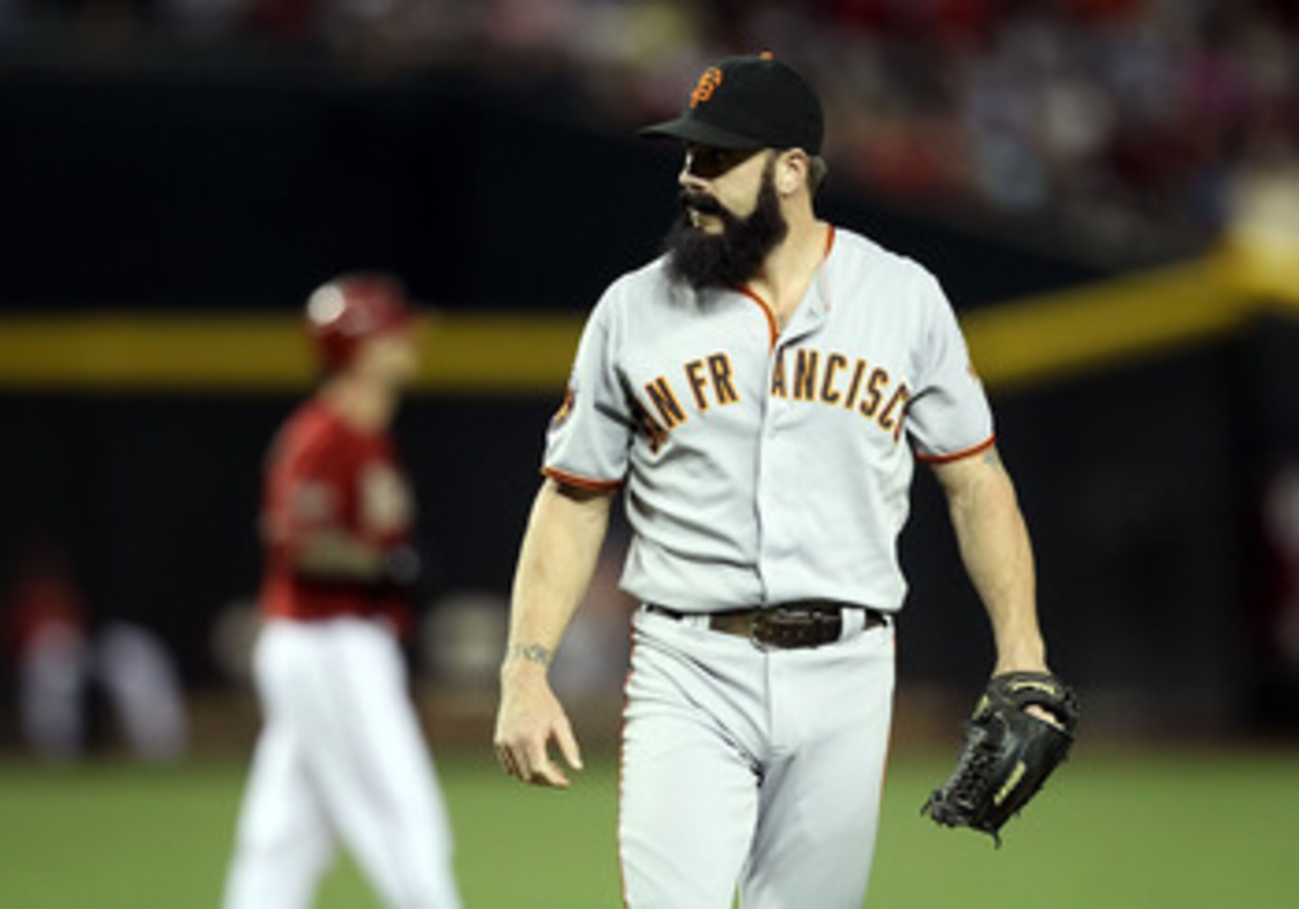 PHOENIX, AZ - JUNE 15: Relief pitcher Brian Wilson #38 of the San Francisco Giants during the Major League Baseball game against the Arizona Diamondbacks at Chase Field on June 15, 2011 in Phoenix, Arizona. The Giants defeated the Diamondbacks 5-2. (Pho PHOENIX, AZ - JUNE 15: Relief pitcher Brian Wilson #38 of the San Francisco Giants during the Major League Baseball game against the Arizona Diamondbacks at Chase Field on June 15, 2011 in Phoenix, Arizona. The Giants defeated the Diamondbacks 5-2. (Pho