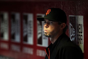 PHOENIX, AZ - APRIL 16:  Eli Whiteside #22 of the San Francisco Giants watches from the dugout during the Major League Baseball game against the Arizona Diamondbacks at Chase Field on April 16, 2011 in Phoenix, Arizona.  (Photo by Christian Petersen/Getty