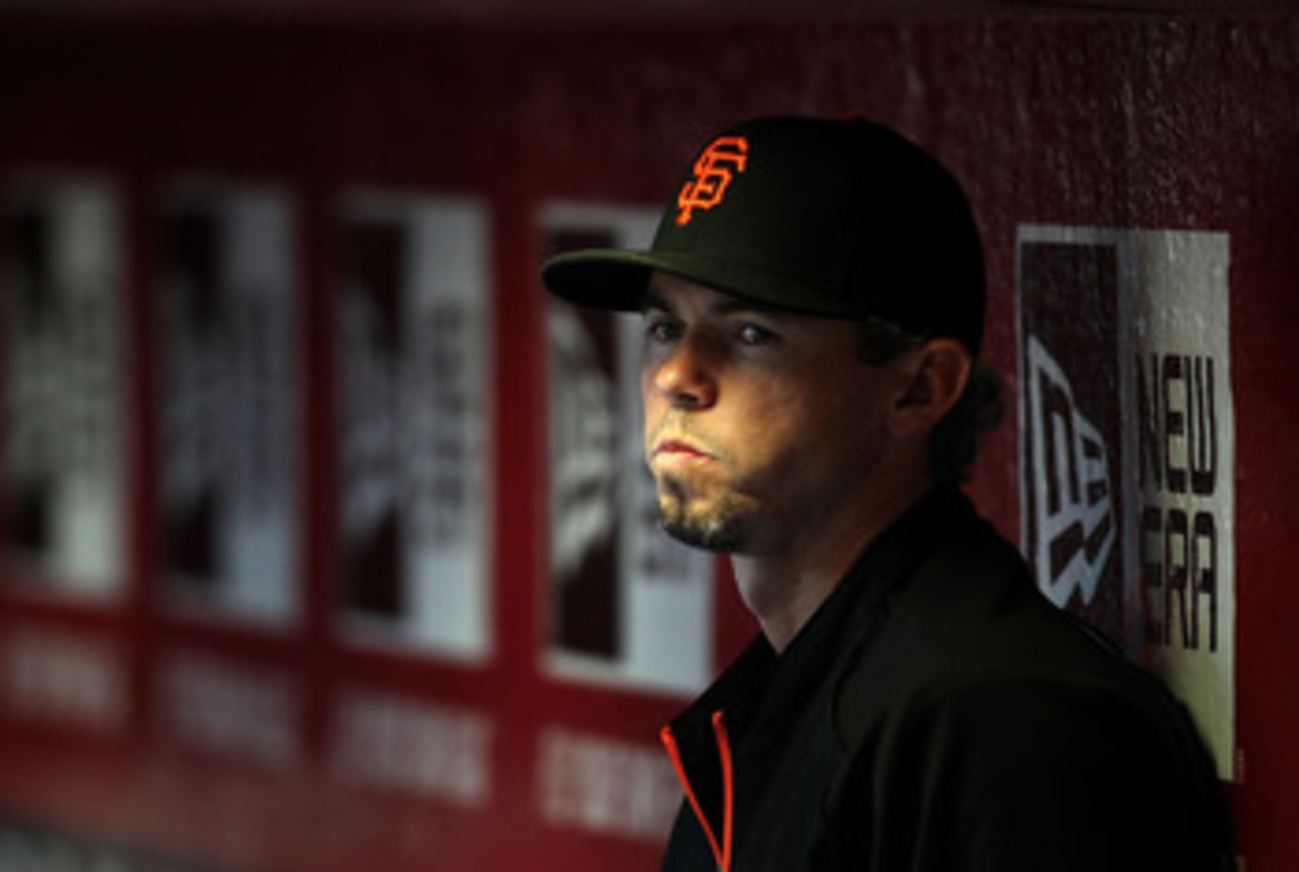 PHOENIX, AZ - APRIL 16:  Eli Whiteside #22 of the San Francisco Giants watches from the dugout during the Major League Baseball game against the Arizona Diamondbacks at Chase Field on April 16, 2011 in Phoenix, Arizona.  (Photo by Christian Petersen/Getty