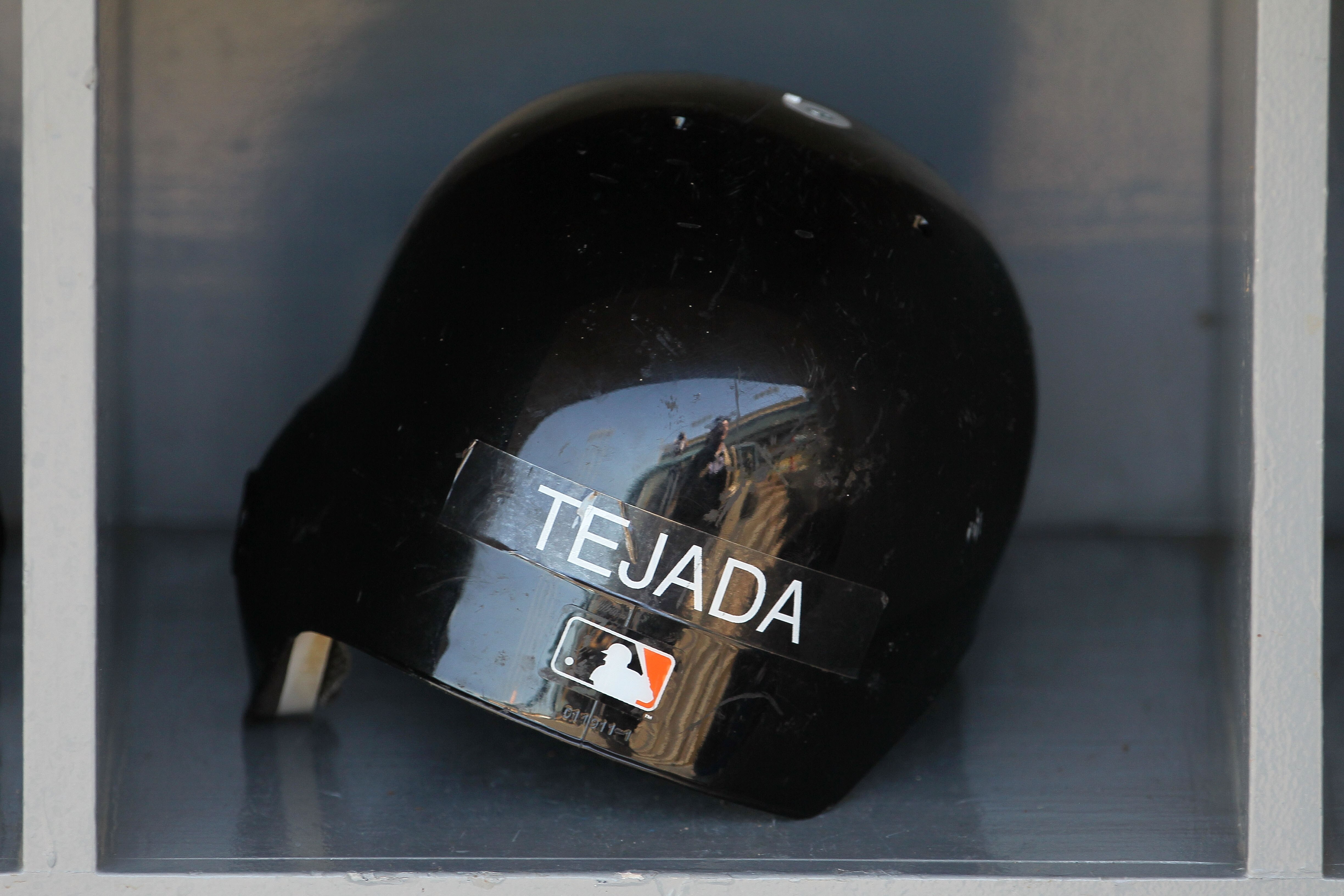 LOS ANGELES, CA - MARCH 31:  The helmet of Miguel Tejada #10 of the San Francisco Giants sits in the dugout prior to their Opening Day game against the Los Angeles Dodgers at Dodger Stadium on March 31, 2011 in Los Angeles, California.  (Photo by Jeff Gro
