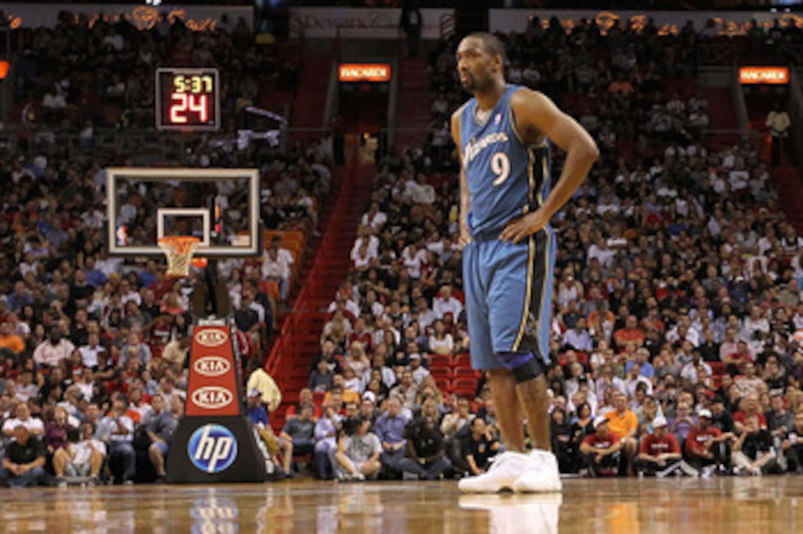 MIAMI, FL - NOVEMBER 29:  Gilbert Arenas #9 of the Washington Wizards looks on during a game against the Miami Heat at American Airlines Arena on November 29, 2010 in Miami, Florida. NOTE TO USER: User expressly acknowledges and agrees that, by downloadin