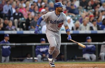 DENVER, CO - JUNE 09:  Matt Kemp #27 of the Los Angeles Dodgers takes an at bat against the Colorado Rockies at Coors Field on June 9, 2011 in Denver, Colorado. Kemp had a double, triple and a homerun in the game as the Rockies defeated the Dodgers 9-7.  