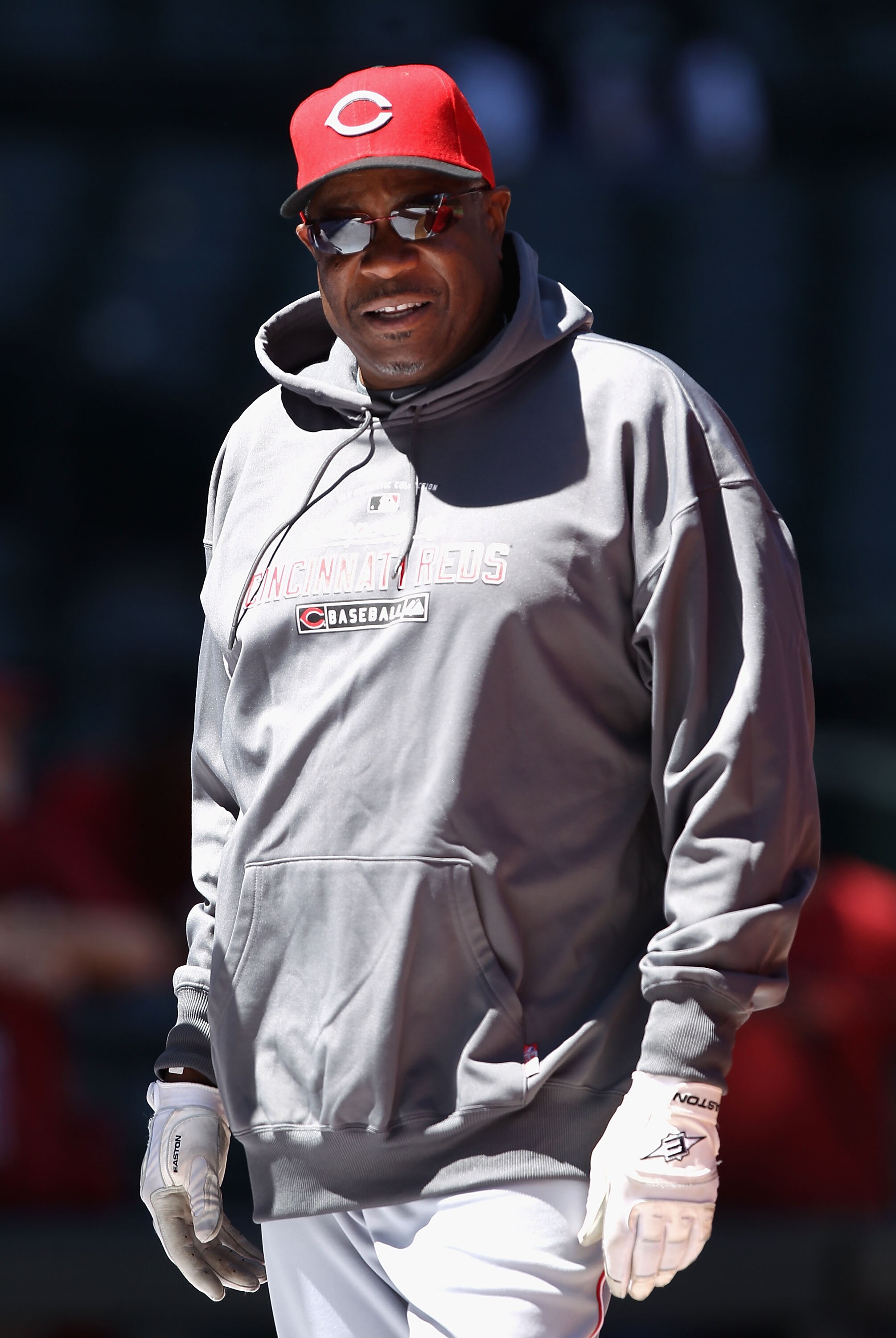PHOENIX, AZ - APRIL 10:  Manager Dusty Baker of the Cincinnati Reds walks on the field before the Major League Baseball game against the Arizona Diamondbacks at Chase Field on April 10, 2011 in Phoenix, Arizona.  (Photo by Christian Petersen/Getty Images)