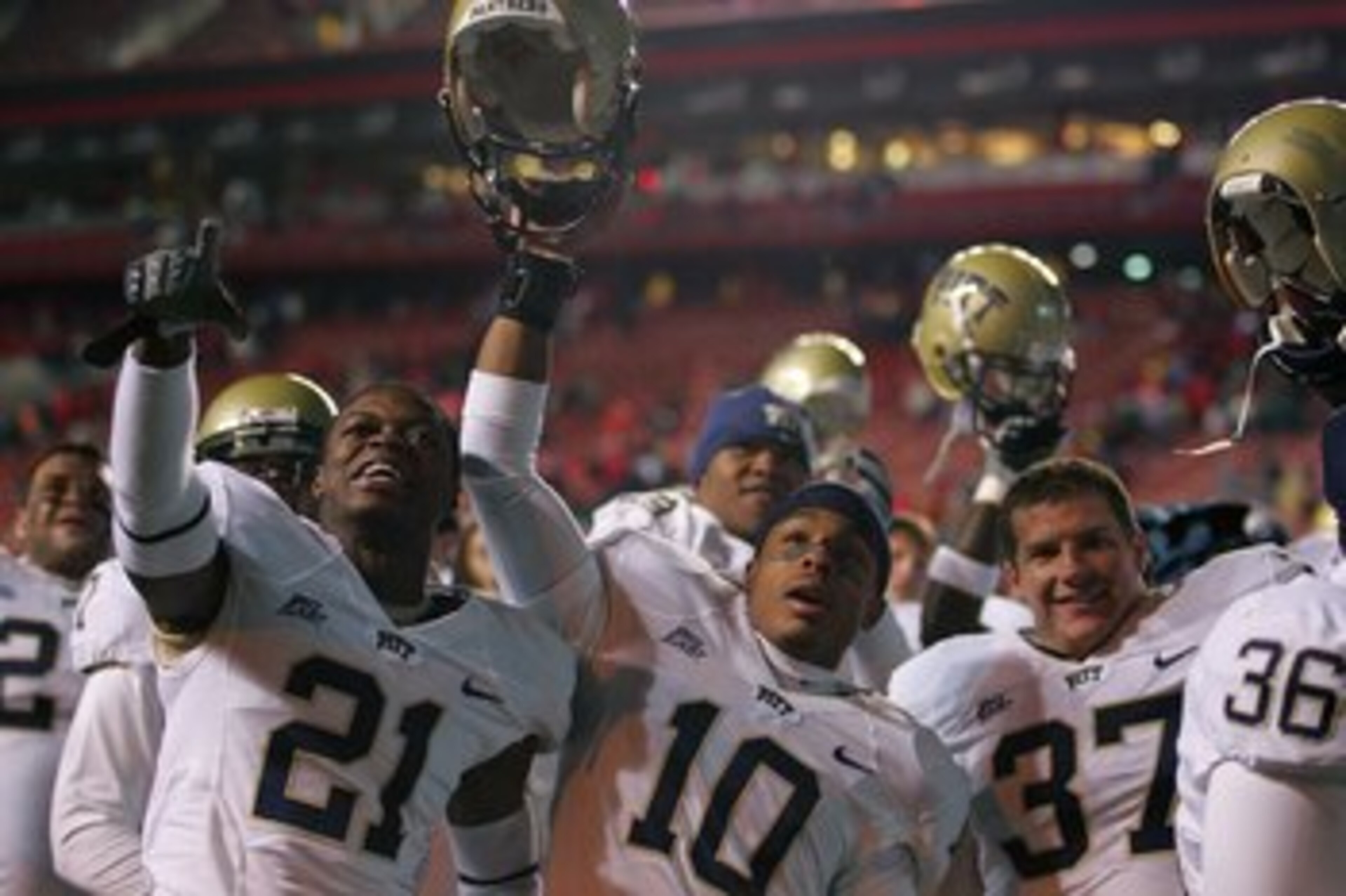 PISCATAWAY, NJ - OCTOBER 16: Buddy Jackson #21, Aundre Wright #10, and Joe Capp #37 of the University of Pittsburgh Panthers celebrate after their win against the Rutgers University Scarlett Knights on October 16, 2009 at Rutgers Stadium in Piscataway, Ne PISCATAWAY, NJ - OCTOBER 16: Buddy Jackson #21, Aundre Wright #10, and Joe Capp #37 of the University of Pittsburgh Panthers celebrate after their win against the Rutgers University Scarlett Knights on October 16, 2009 at Rutgers Stadium in Piscataway, Ne
