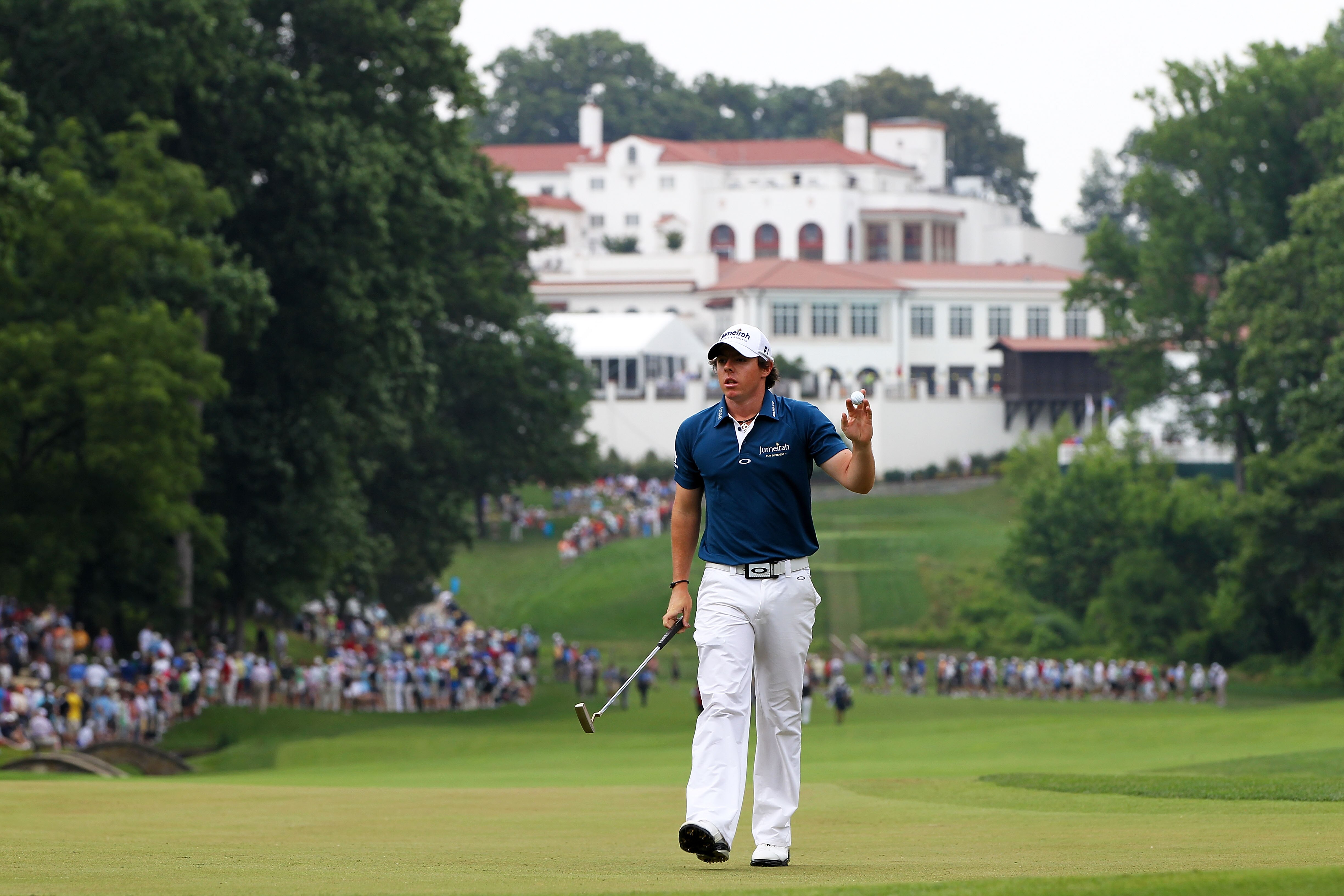 BETHESDA, MD - JUNE 16:  Rory McIlroy of Northern Ireland waves to the gallery on the 11th green during the first round of the 111th U.S. Open at Congressional Country Club on June 16, 2011 in Bethesda, Maryland.  (Photo by Jamie Squire/Getty Images)