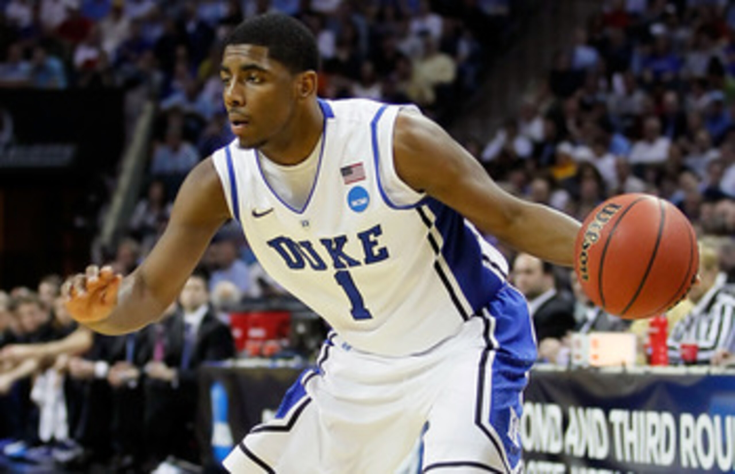CHARLOTTE, NC - MARCH 20:  Kyrie Irving #1 of the Duke Blue Devils moves the ball while taking on the Michigan Wolverines during the third round of the 2011 NCAA men's basketball tournament at Time Warner Cable Arena on March 20, 2011 in Charlotte, North