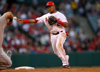 ANAHEIM, CA - JUNE 11:  Erick Aybar #2 of the Los Angeles Angels of Anaheim turns a double playto end the third inning against the Kansas City Royals on June 11, 2011 at Angel Stadium in Anaheim, California.  (Photo by Stephen Dunn/Getty Images)