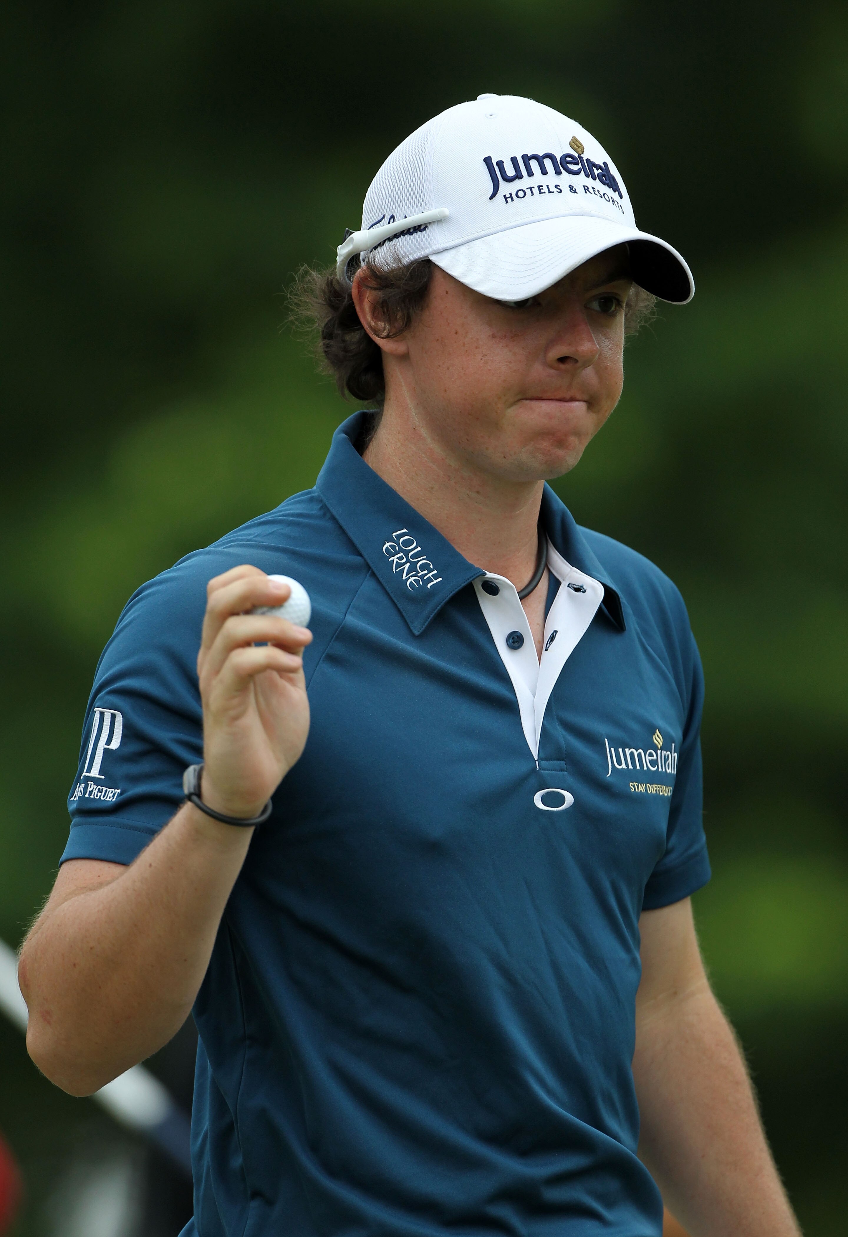 BETHESDA, MD - JUNE 16:  Rory McIlroy of Northern Ireland waves to the gallery on the seventh during the first round of the 111th U.S. Open at Congressional Country Club on June 16, 2011 in Bethesda, Maryland.  (Photo by Jamie Squire/Getty Images)