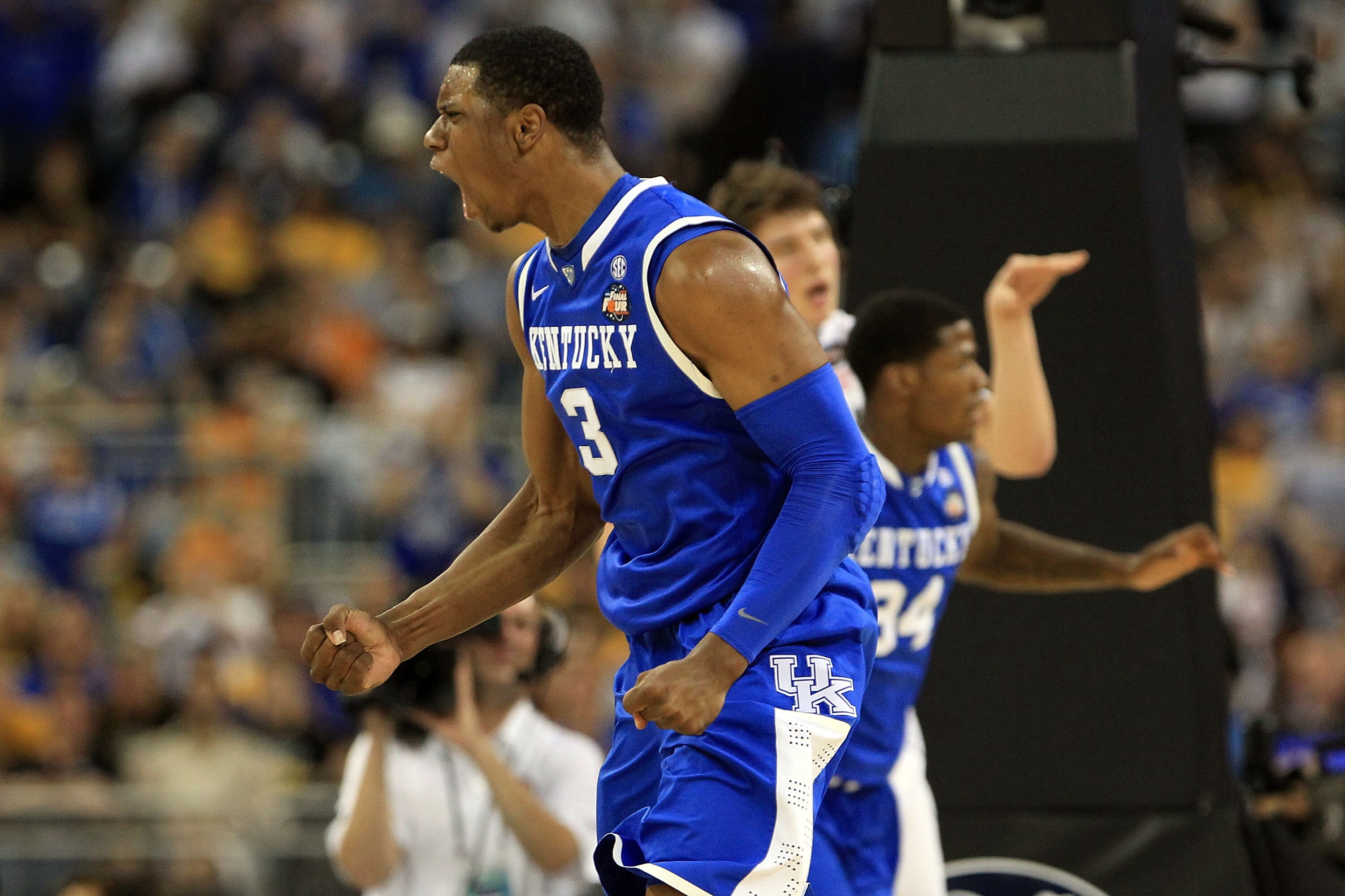 HOUSTON, TX - APRIL 02:  DeAndre Liggins #34 of the Kentucky Wildcats reacts after a play against the Connecticut Huskies during the National Semifinal game of the 2011 NCAA Division I Men's Basketball Championship at Reliant Stadium on April 2, 2011 in H