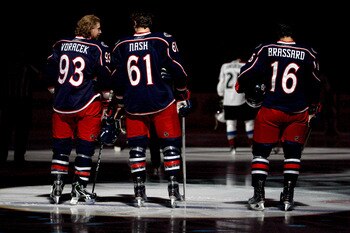 COLUMBUS, OH - FEBRUARY 11: Jakub Voracek #93, Rick Nash #61, and Derick Brassard #16, all of the Columbus Blue Jackets stand during the National Anthem prior to the start of the game against the Colorado Avalanche on February 11, 2011 at Nationwide Arena