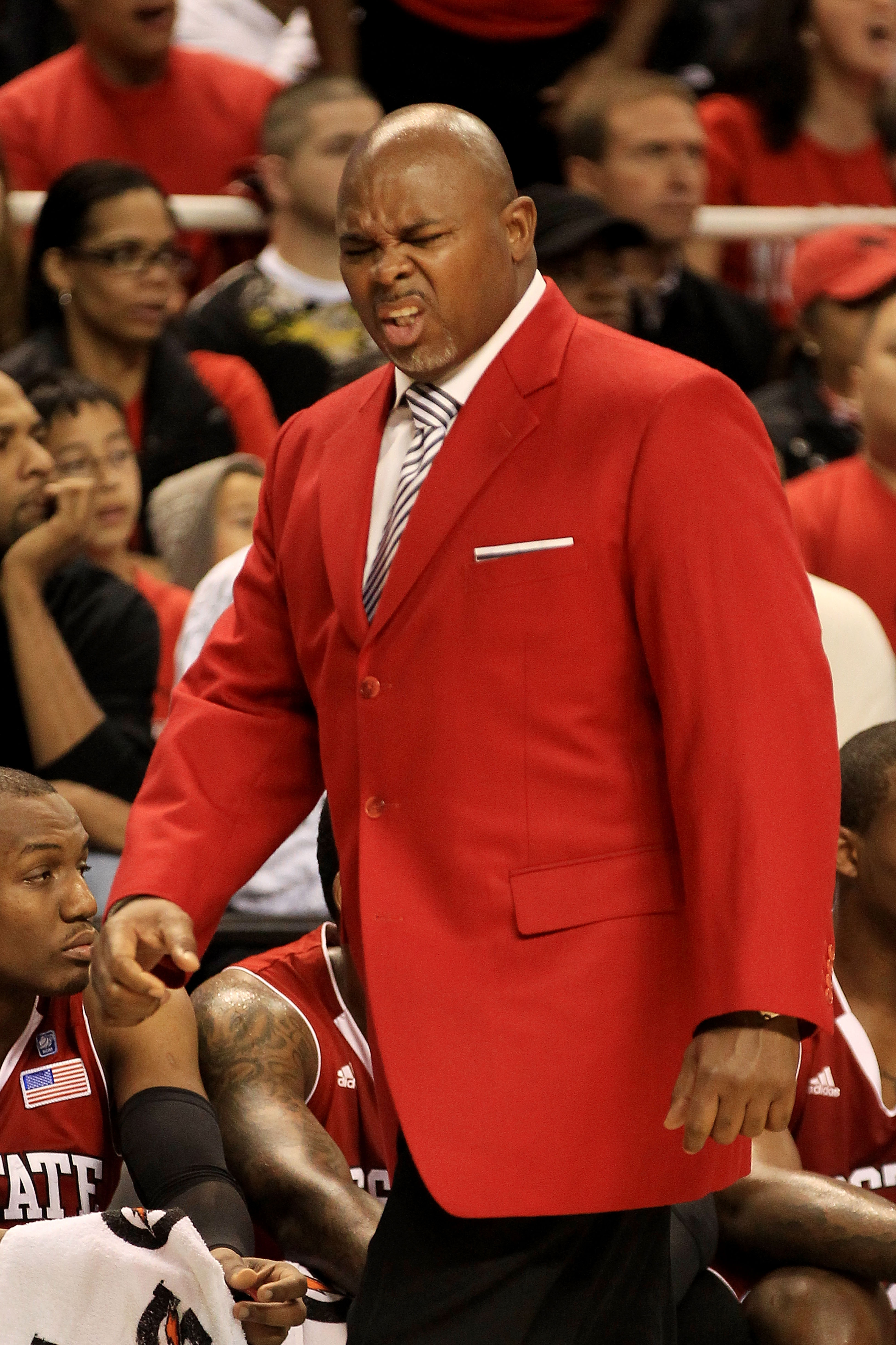 GREENSBORO, NC - MARCH 10:  Head coach Sidney Lowe of the North Carolina State Wolfpack reacts during the first half of the game against the Maryland Terrapins in the first round of the 2011 ACC men's basketball tournament at the Greensboro Coliseum on Ma