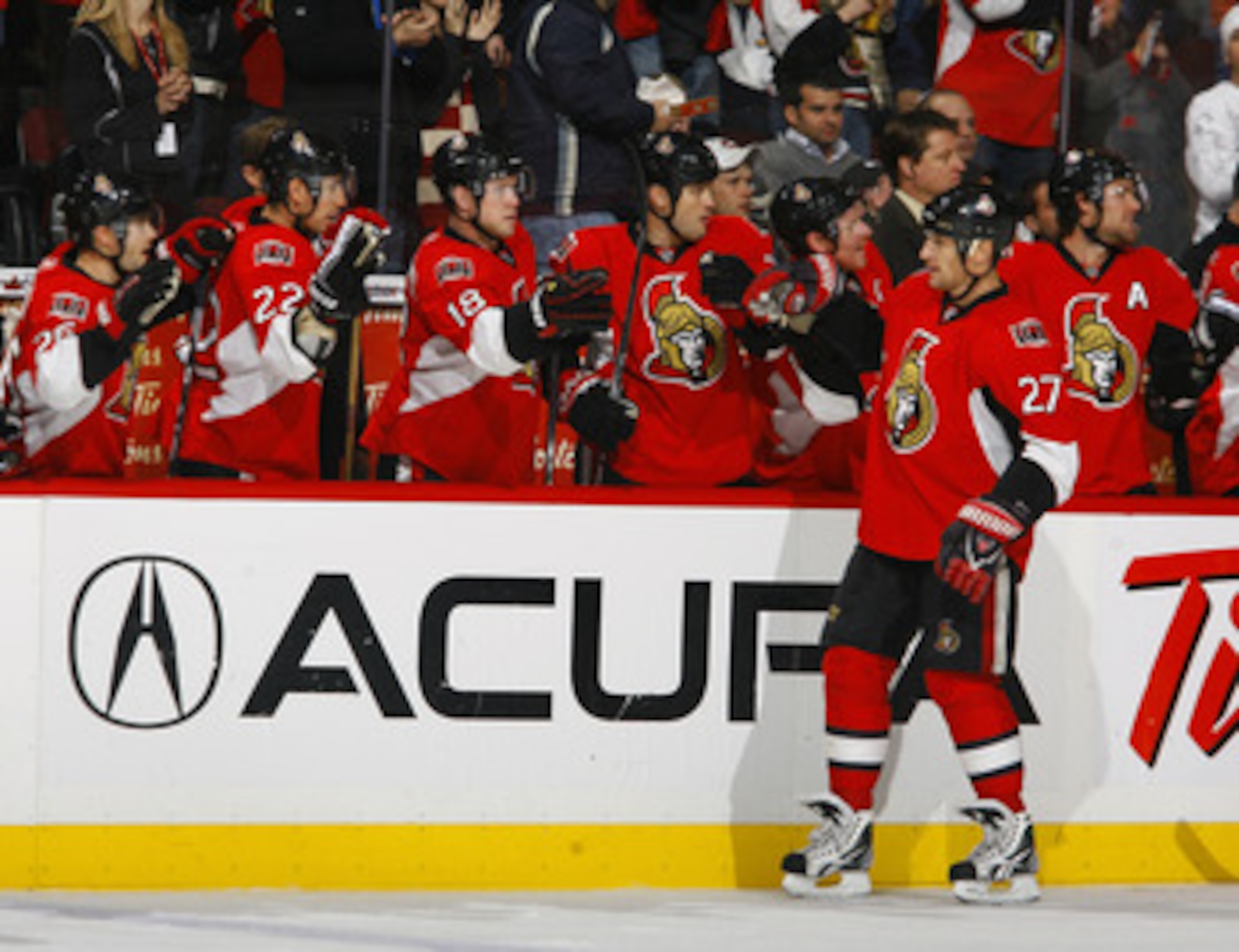 OTTAWA, ON - NOVEMBER 22: Alex Kovalev #27 of the Ottawa Senators celebrates his goal and his 1000th NHL regular season point with his teammates on the bench during a game against the Los Angeles Kings at Scotiabank Place on November 22, 2010 in Ottawa, OTTAWA, ON - NOVEMBER 22: Alex Kovalev #27 of the Ottawa Senators celebrates his goal and his 1000th NHL regular season point with his teammates on the bench during a game against the Los Angeles Kings at Scotiabank Place on November 22, 2010 in Ottawa,