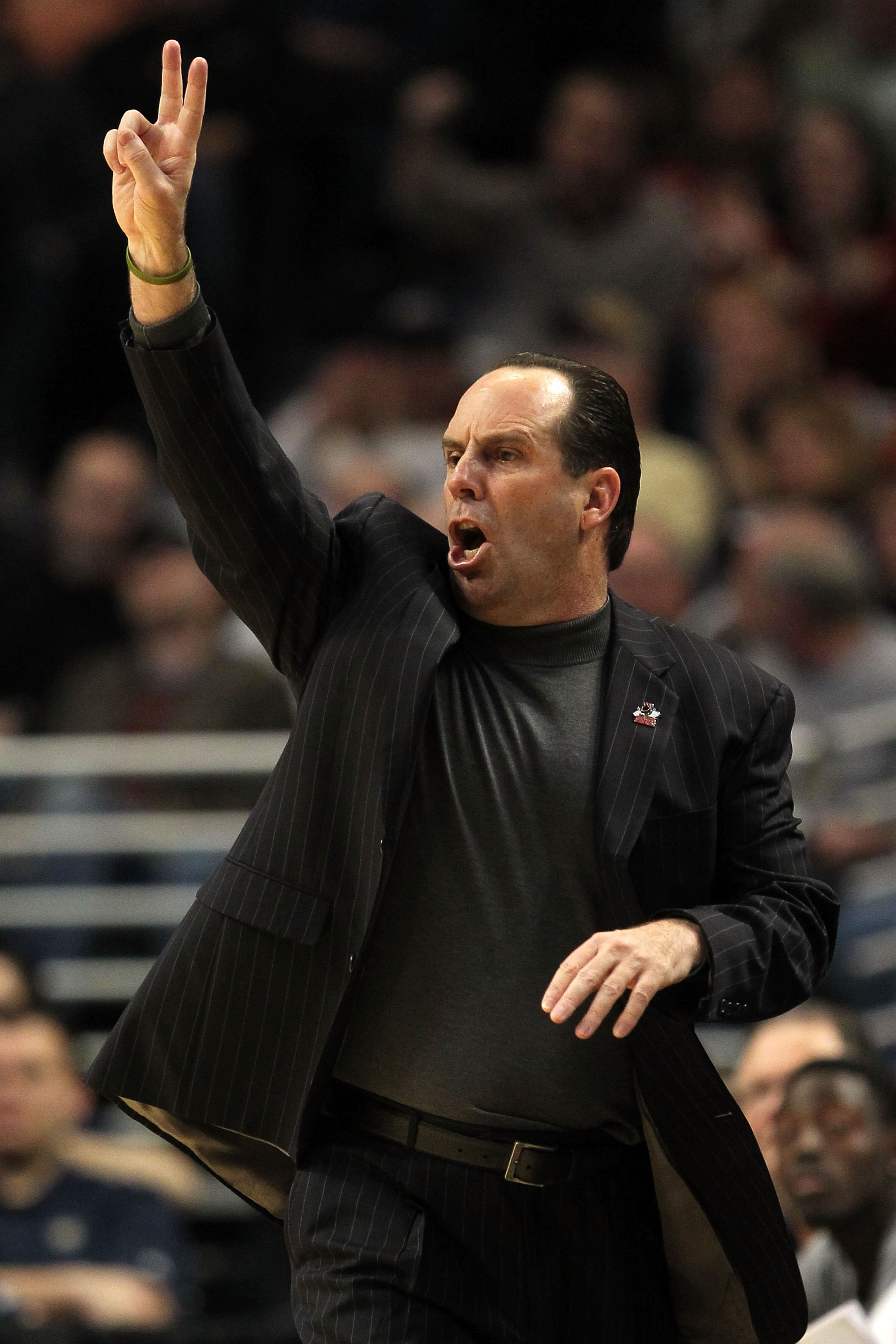CHICAGO, IL - MARCH 20:  Head coach Mike Brey of the Notre Dame Fighting Irish reacts in the game against the Florida State Seminoles during the third round of the 2011 NCAA men's basketball tournament at the United Center on March 20, 2011 in Chicago, Il
