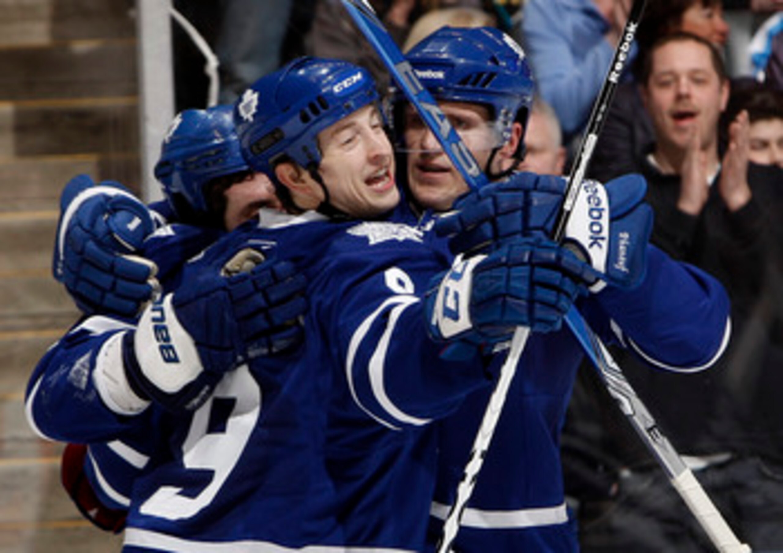 TORONTO, CANADA - FEBRUARY 26: Colby Armstrong #9 and Dion Phaneuf #3 of the Toronto Maple Leafs celebrate Colby Armstrong goal against the Pittsburgh Penguins during game action at the Air Canada Centre February 26, 2011 in Toronto, Ontario, Canada. (Ph TORONTO, CANADA - FEBRUARY 26: Colby Armstrong #9 and Dion Phaneuf #3 of the Toronto Maple Leafs celebrate Colby Armstrong goal against the Pittsburgh Penguins during game action at the Air Canada Centre February 26, 2011 in Toronto, Ontario, Canada. (Ph