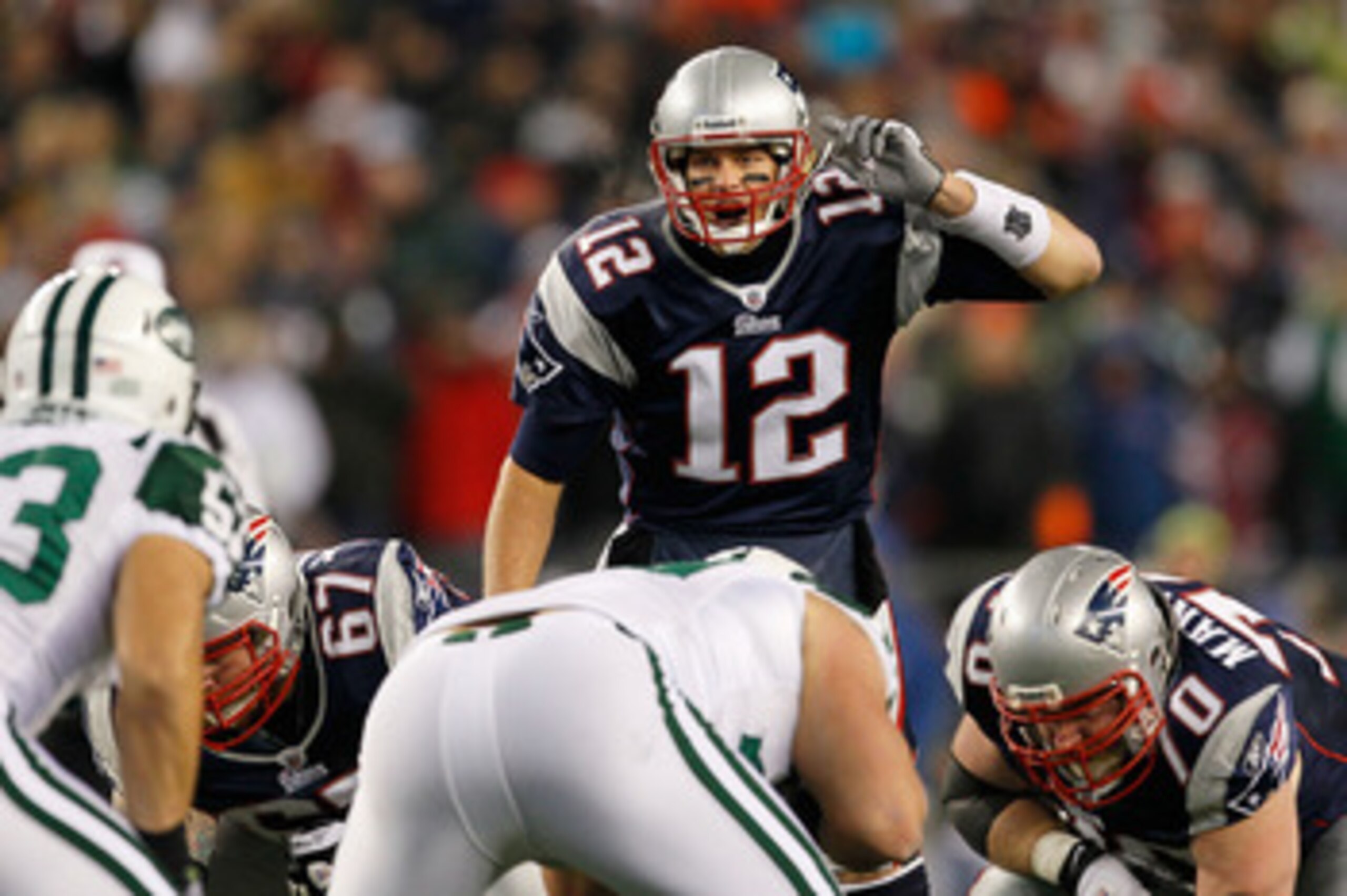 FOXBORO, MA - DECEMBER 06:  Tom Brady #12 of the New England Patriots gestures at the line of scrimmage against the New York Jets at Gillette Stadium on December 6, 2010 in Foxboro, Massachusetts. The Patriots won 45-3. (Photo by Jim Rogash/Getty Images)