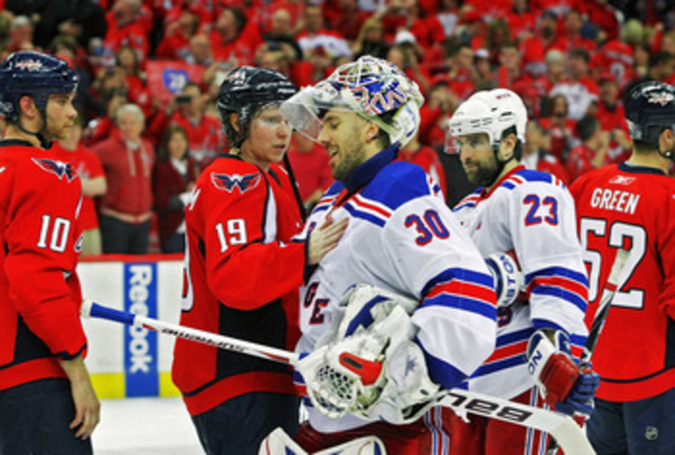 PHILADELPHIA , PA - APRIL 23: Nicklas Backstrom #19 of the Washington Capitals consoles fellow countrymen Henrik Lundqvist #30 of the New York Rangers during the handshake following a 3-1 loose in Game Five of the Eastern Conference Quarterfinals during PHILADELPHIA , PA - APRIL 23: Nicklas Backstrom #19 of the Washington Capitals consoles fellow countrymen Henrik Lundqvist #30 of the New York Rangers during the handshake following a 3-1 loose in Game Five of the Eastern Conference Quarterfinals during