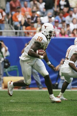 HOUSTON - DECEMBER 3:  Quarterback Vince Young #10 of the Texas Longhorns carries the ball against the Colorado Buffaloes during the Dr. Pepper Big 12 Championship at Reliant Stadium on December 3, 2005  in Houston, Texas. The Longhorns defeated the Buffa