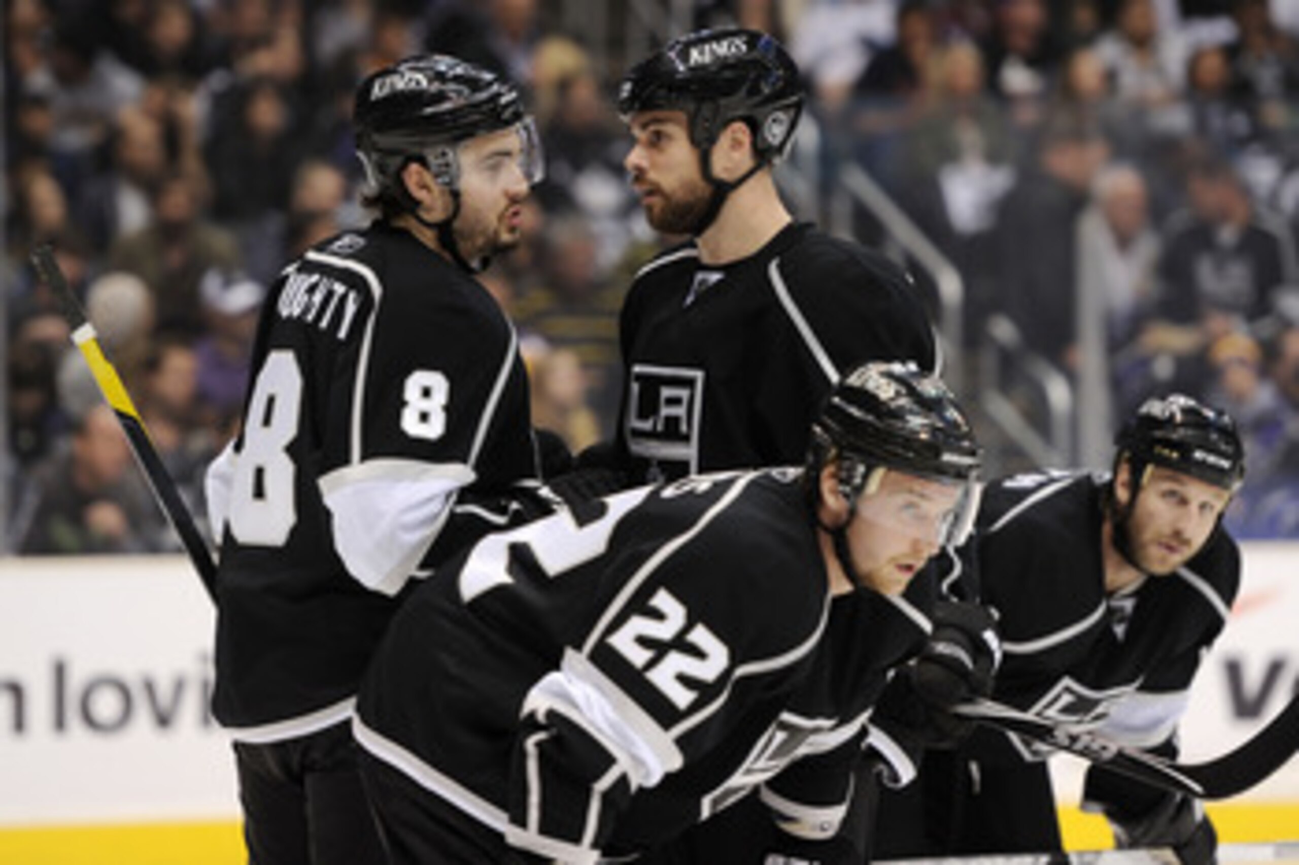 LOS ANGELES, CA - APRIL 25: Drew Doughty #8 speaks with Willie Mitchell #33 of the Los Angeles Kings in the first period of game six of the Western Conference Quarterfinals against the San Jose Sharks during the 2011 NHL Stanley Cup Playoffs at Staples C LOS ANGELES, CA - APRIL 25: Drew Doughty #8 speaks with Willie Mitchell #33 of the Los Angeles Kings in the first period of game six of the Western Conference Quarterfinals against the San Jose Sharks during the 2011 NHL Stanley Cup Playoffs at Staples C