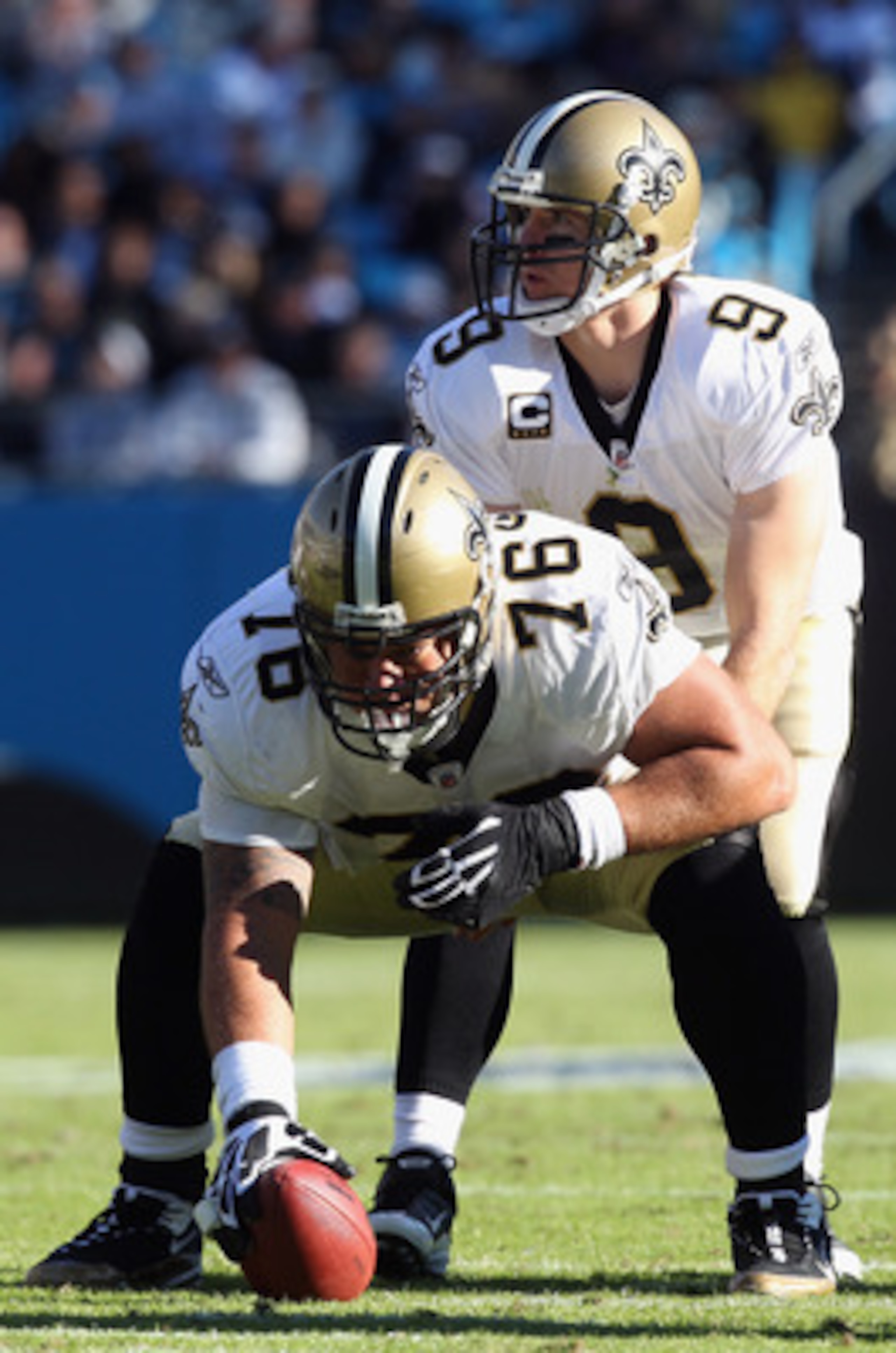 CHARLOTTE, NC - NOVEMBER 07:  Jonathan Goodwin #76 and Drew Brees #9 of the New Orleans Saints against the Carolina Panthers during their game at Bank of America Stadium on November 7, 2010 in Charlotte, North Carolina.  (Photo by Streeter Lecka/Getty Ima