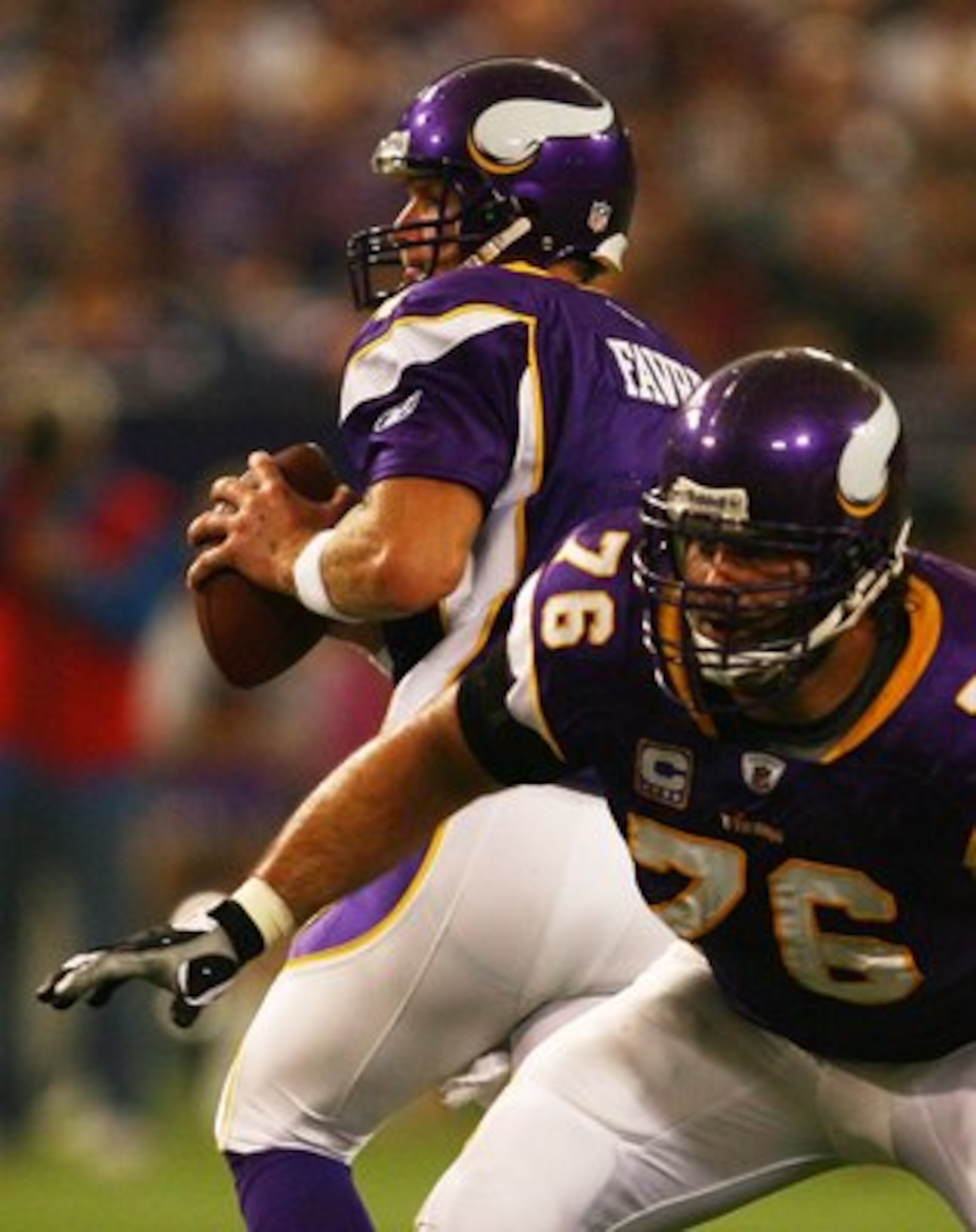 MINNEAPOLIS - SEPTEMBER 27: Brett Favre #4 of the Minnesota Vikings drops back to pass as teammate Steve Hutchinson #76 prepares to block against the San Francisco 49ers at the Hubert H. Humphrey Metrodome on September 27, 2009 in Minneapolis, Minnesota.